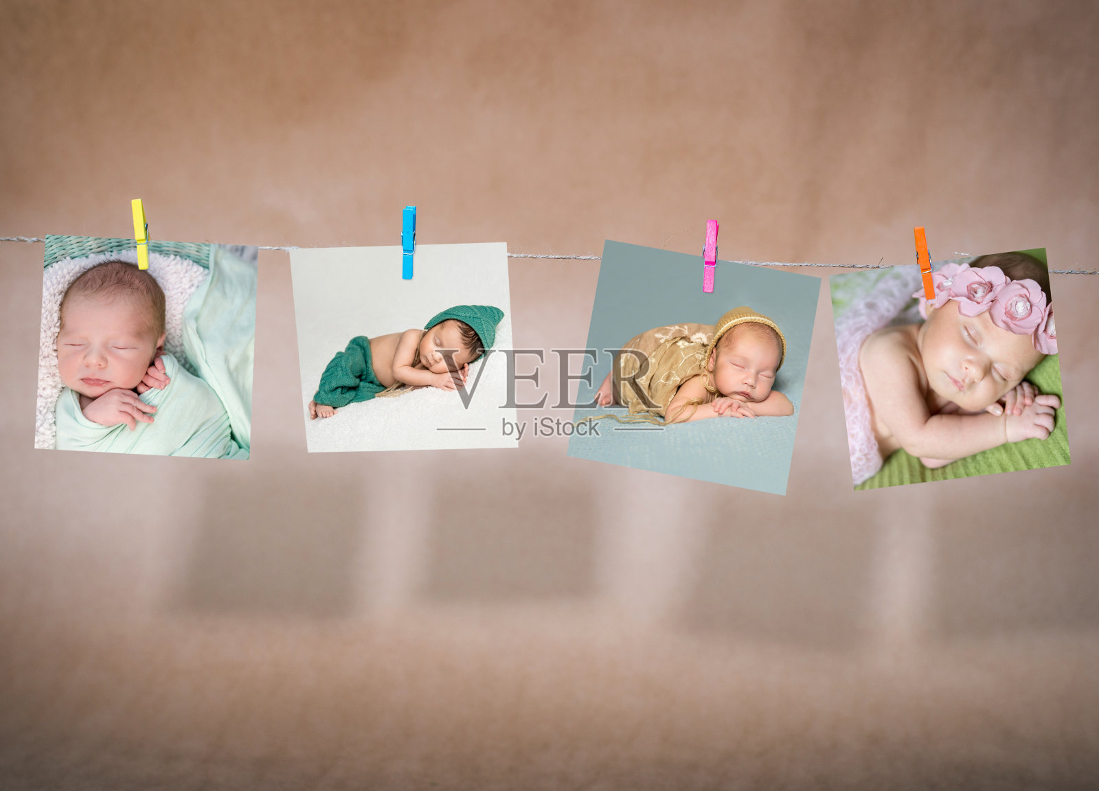 绳子上挂着婴儿的卡片照片摄影图片