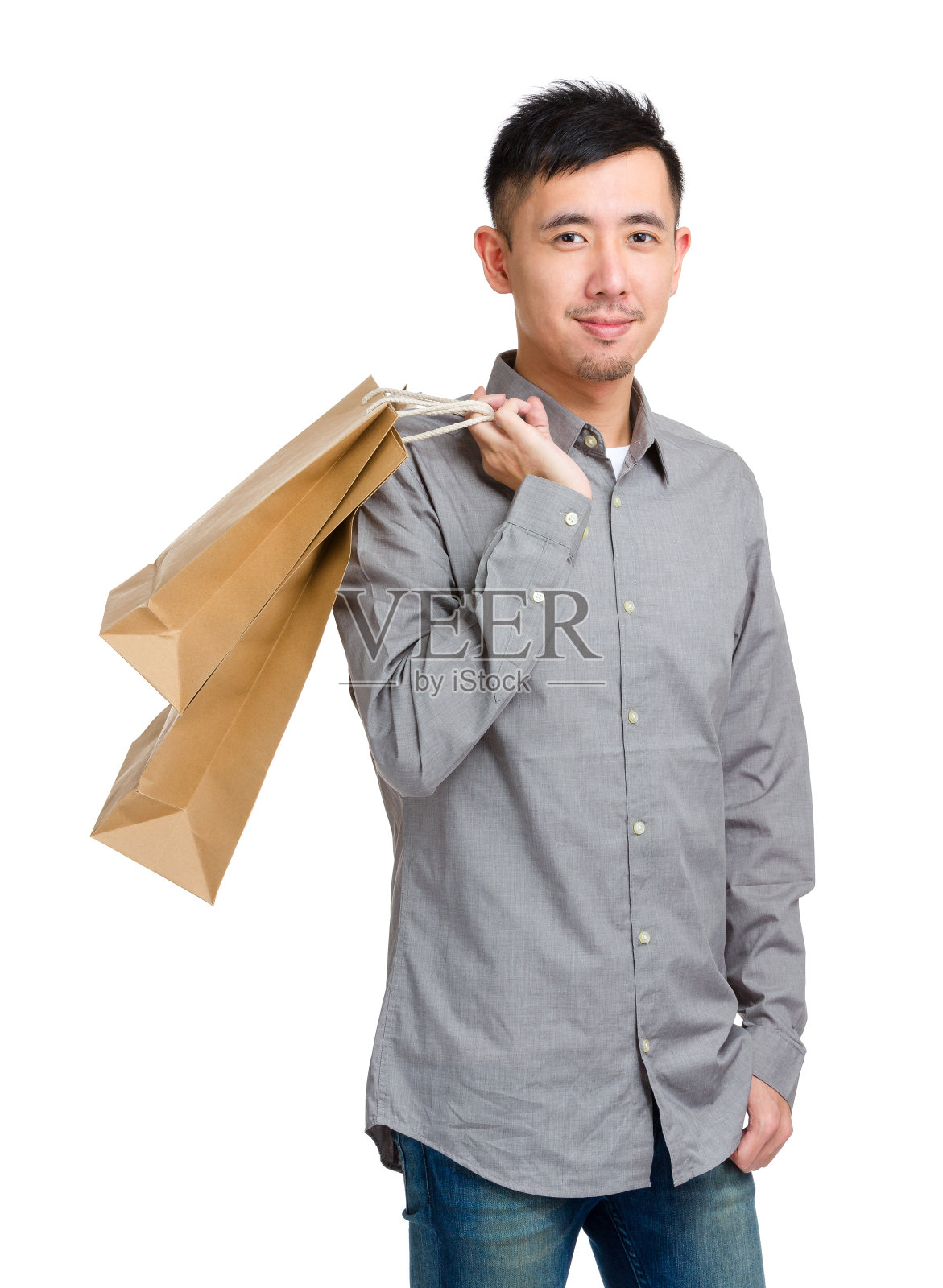 拿着购物袋的中国男人照片摄影图片