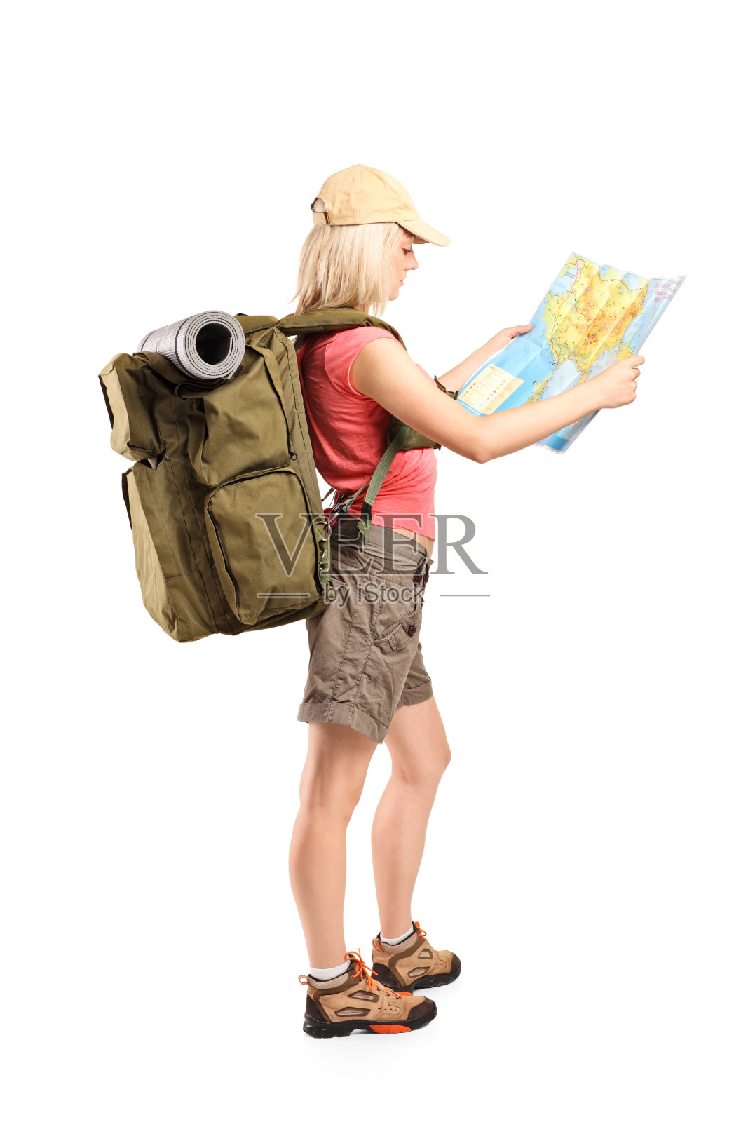 女性游客看地图的侧面照片照片摄影图片