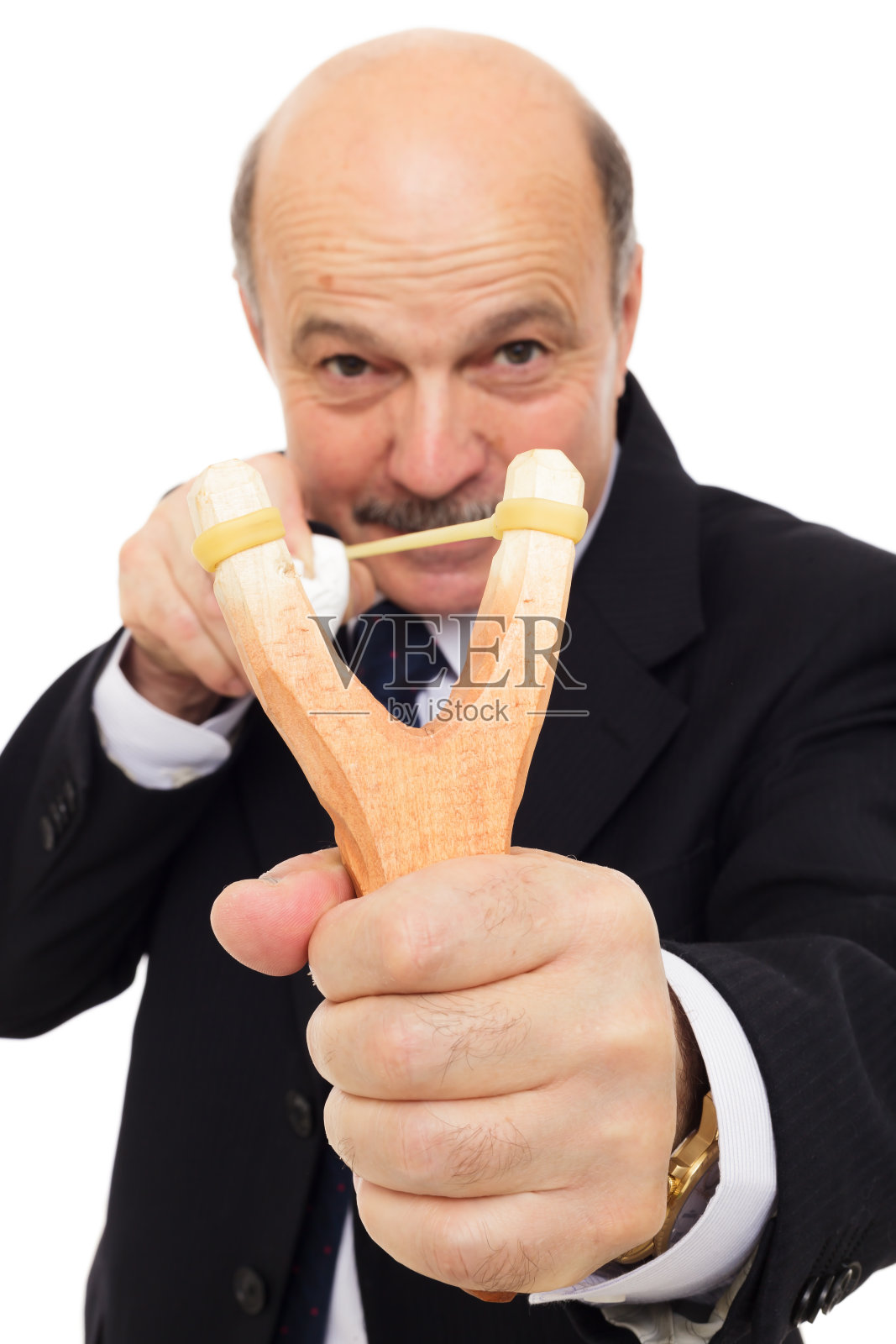 穿着西装的经理在玩弹弓照片摄影图片