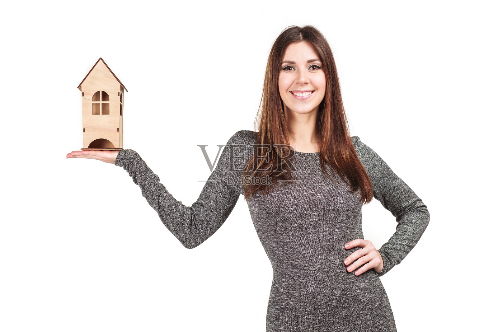 手里拿着房子的女人孤身一人照片摄影图片
