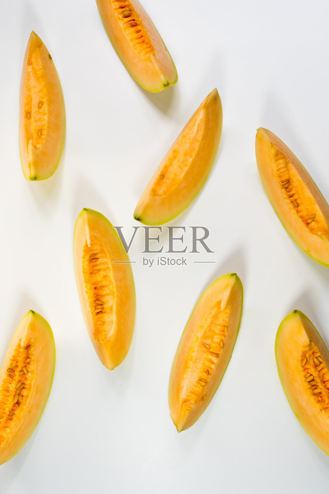哈密瓜片摆放整齐照片摄影图片