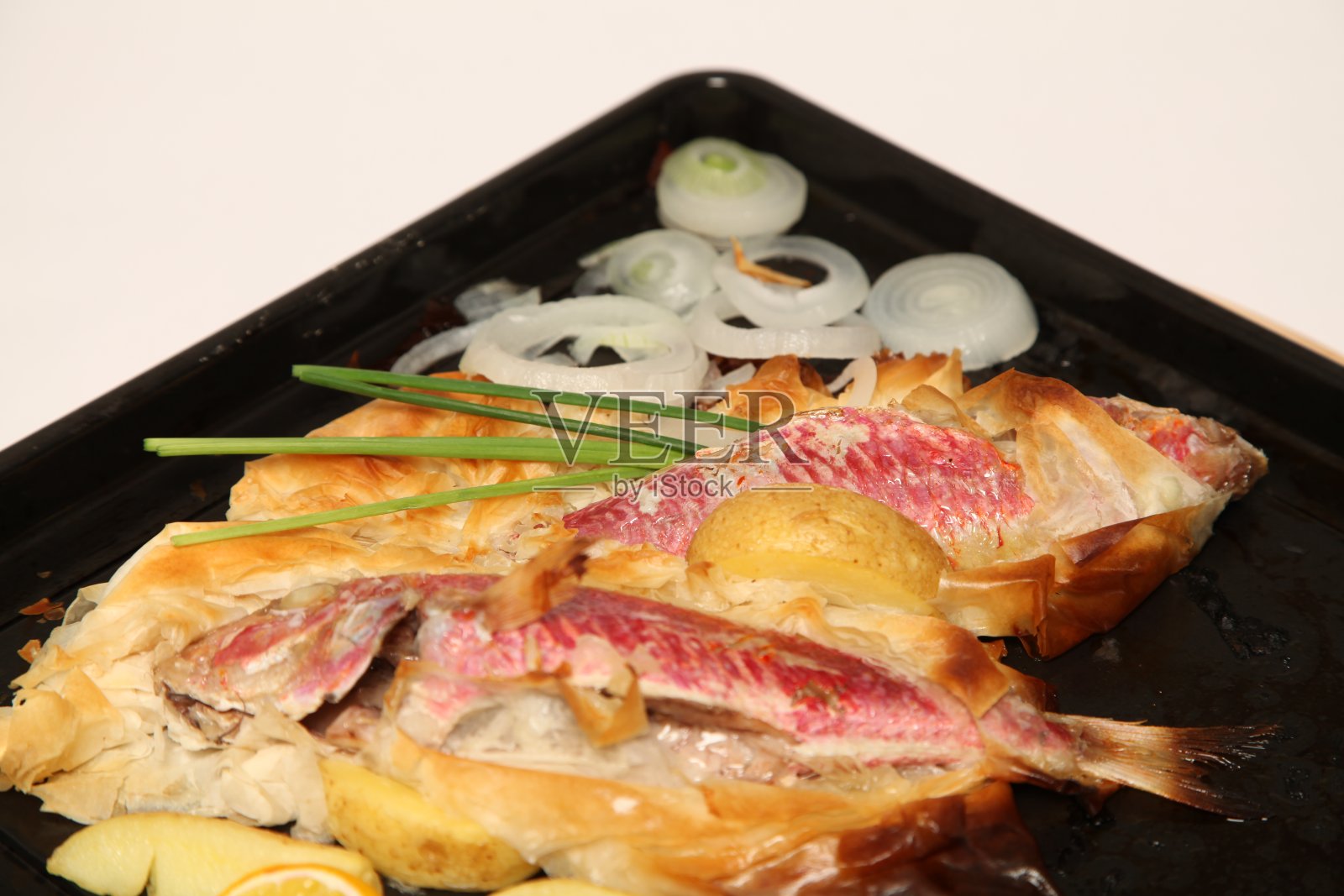 玫瑰鱼饼照片摄影图片