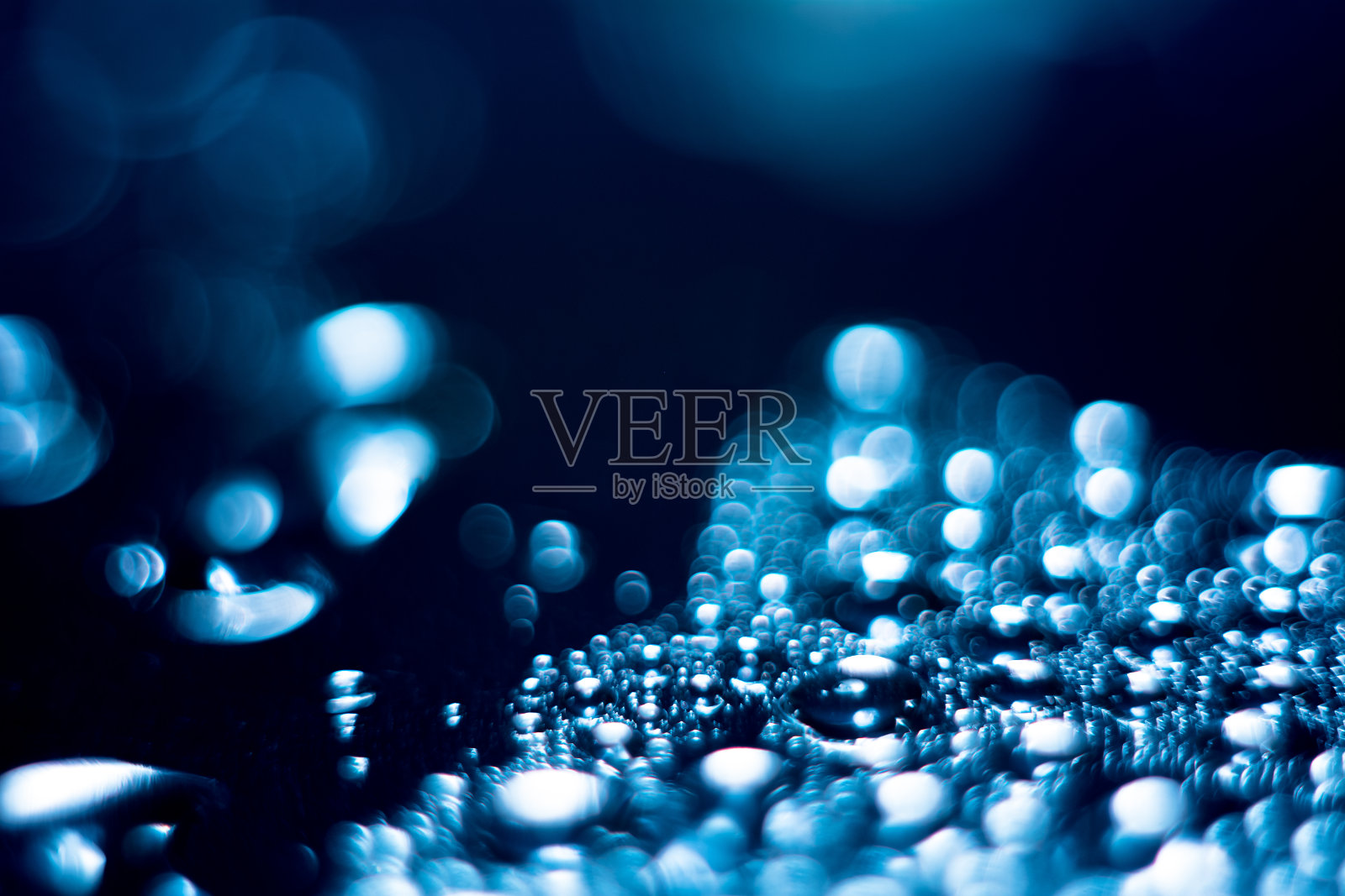 蓝色水滴的特写照片摄影图片