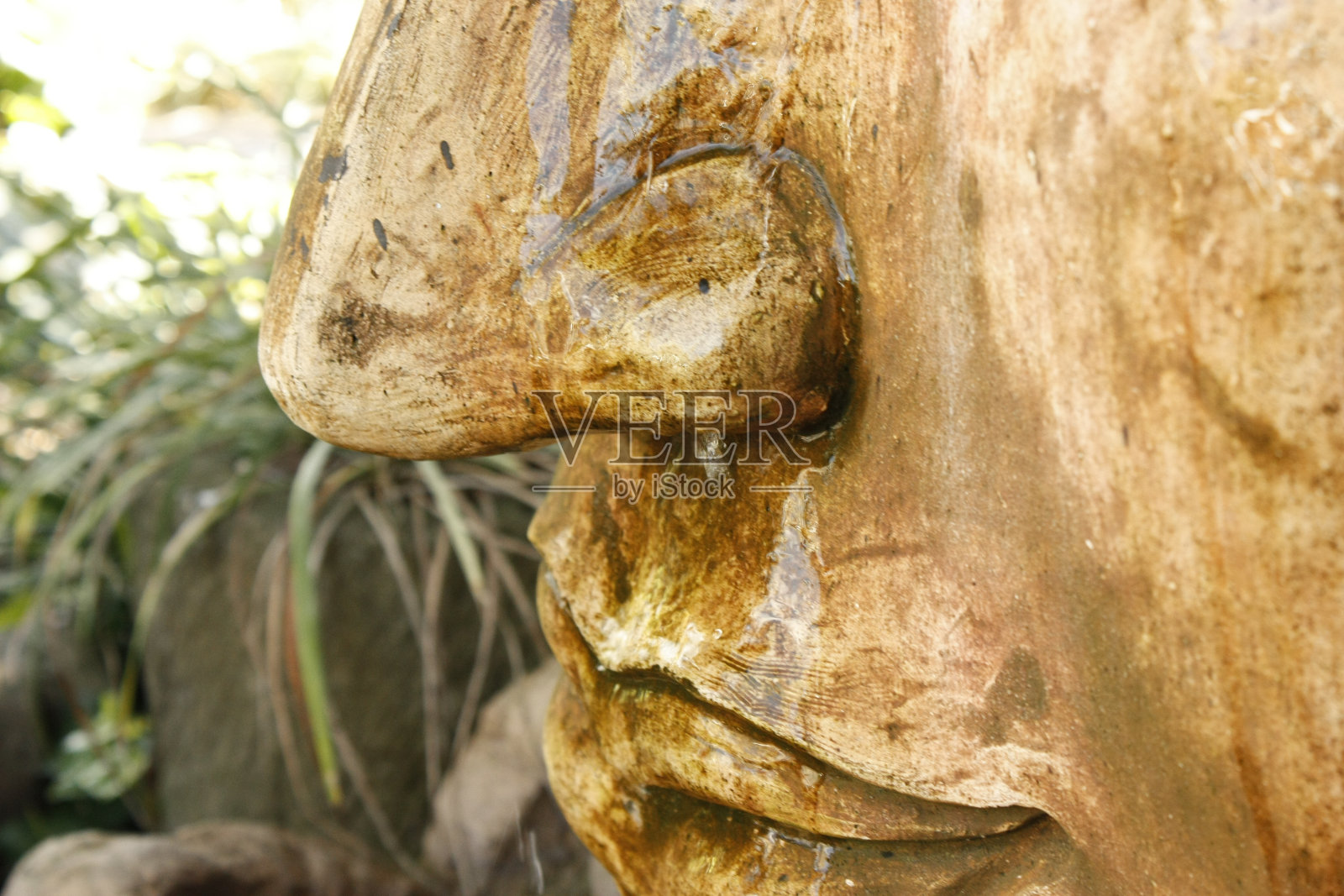 一个石头雕像的特写照片摄影图片