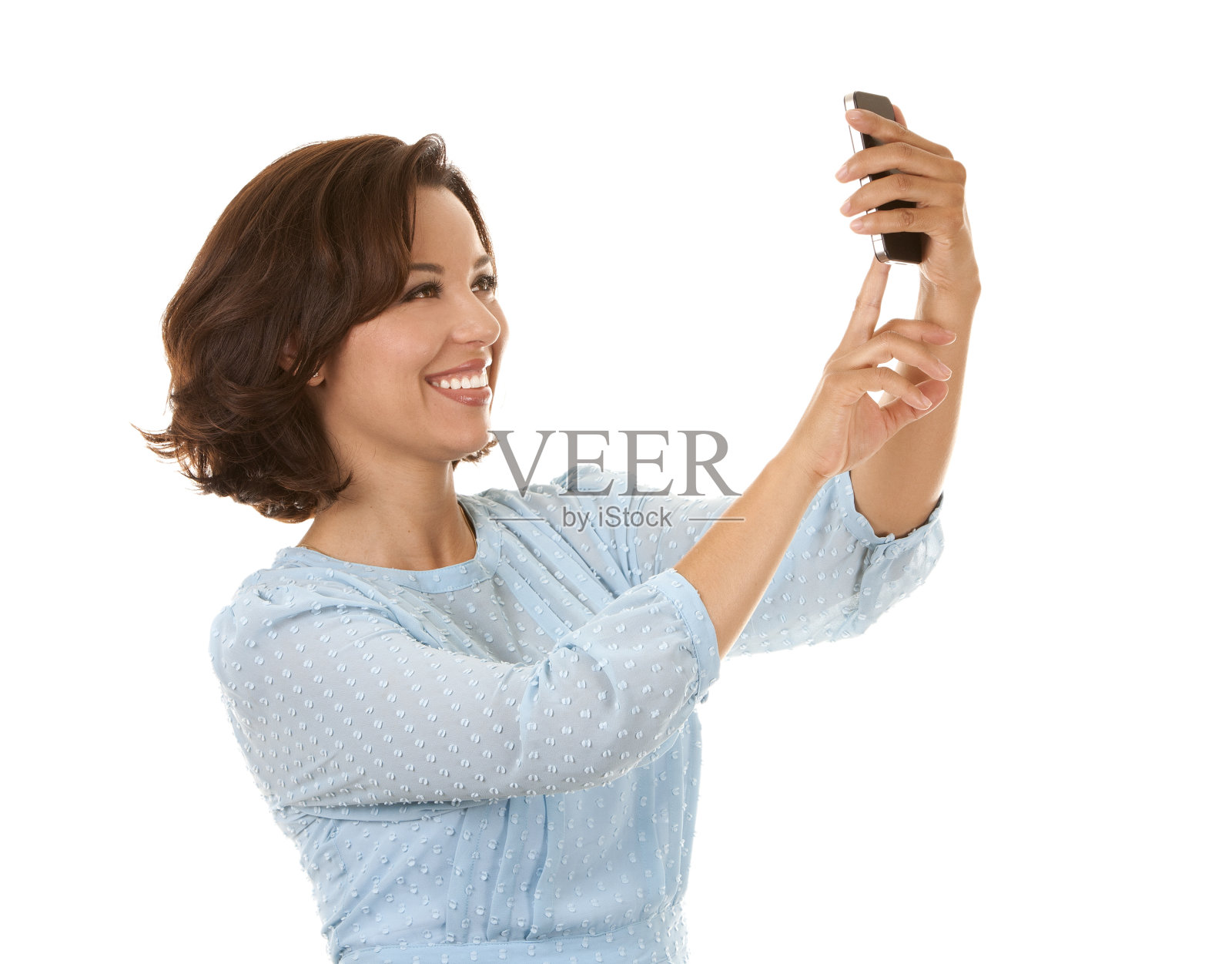 电话里的女商人照片摄影图片