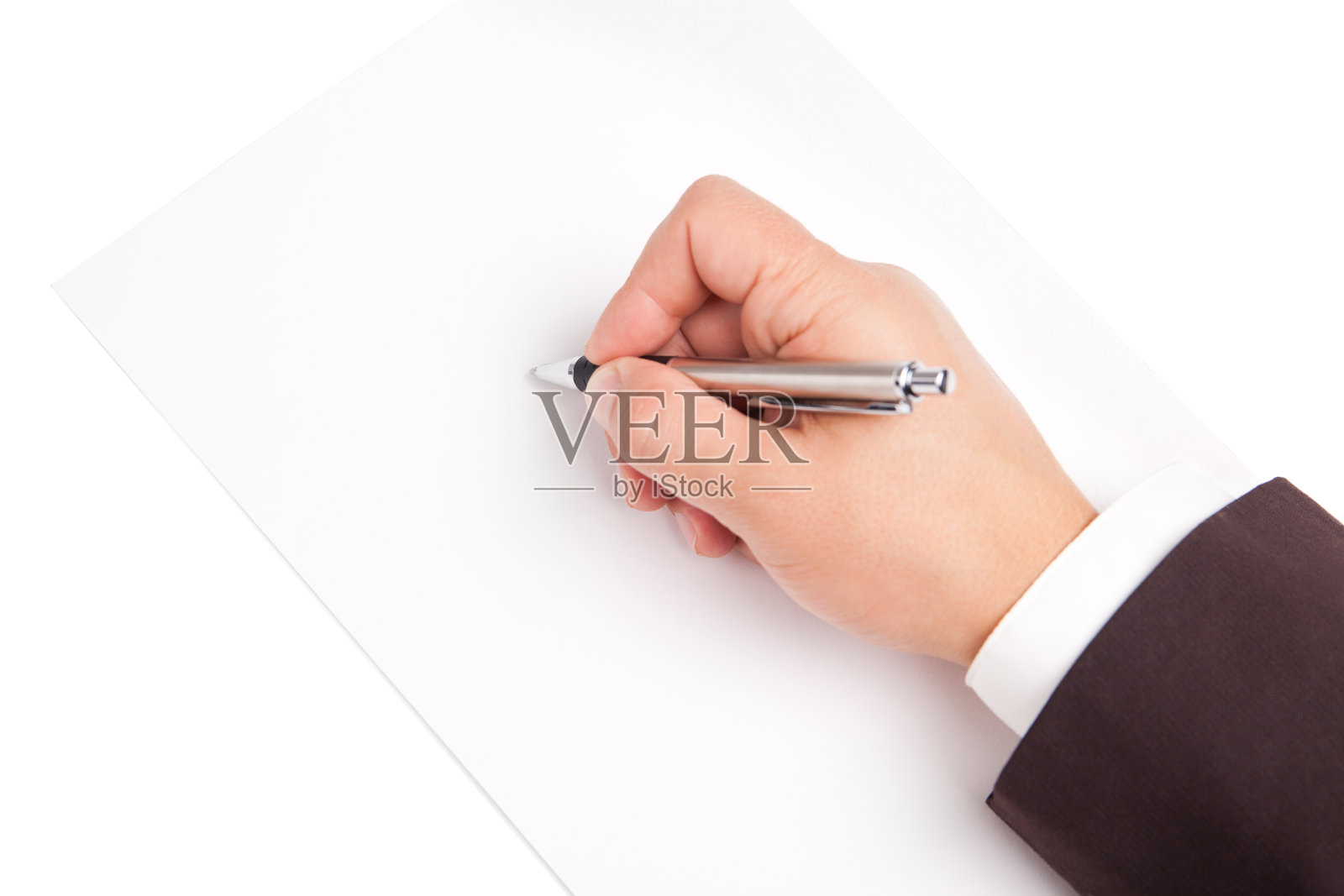 手握笔孤立的白色背景照片摄影图片