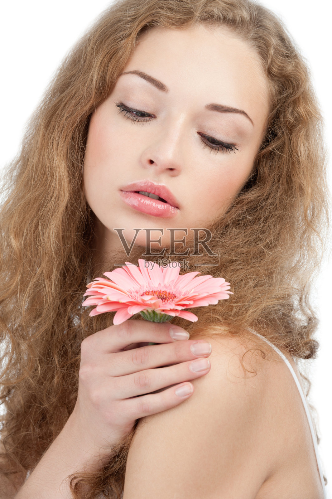 手持鲜花的漂亮女人照片摄影图片