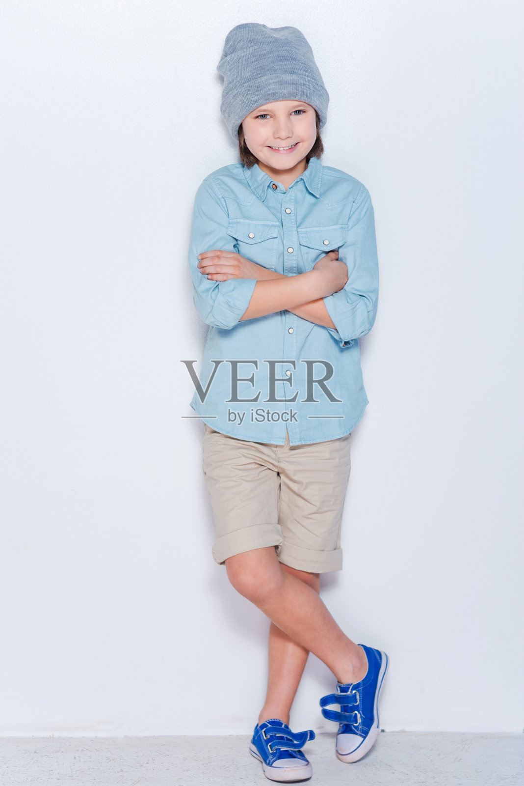 时尚的小男孩。照片摄影图片