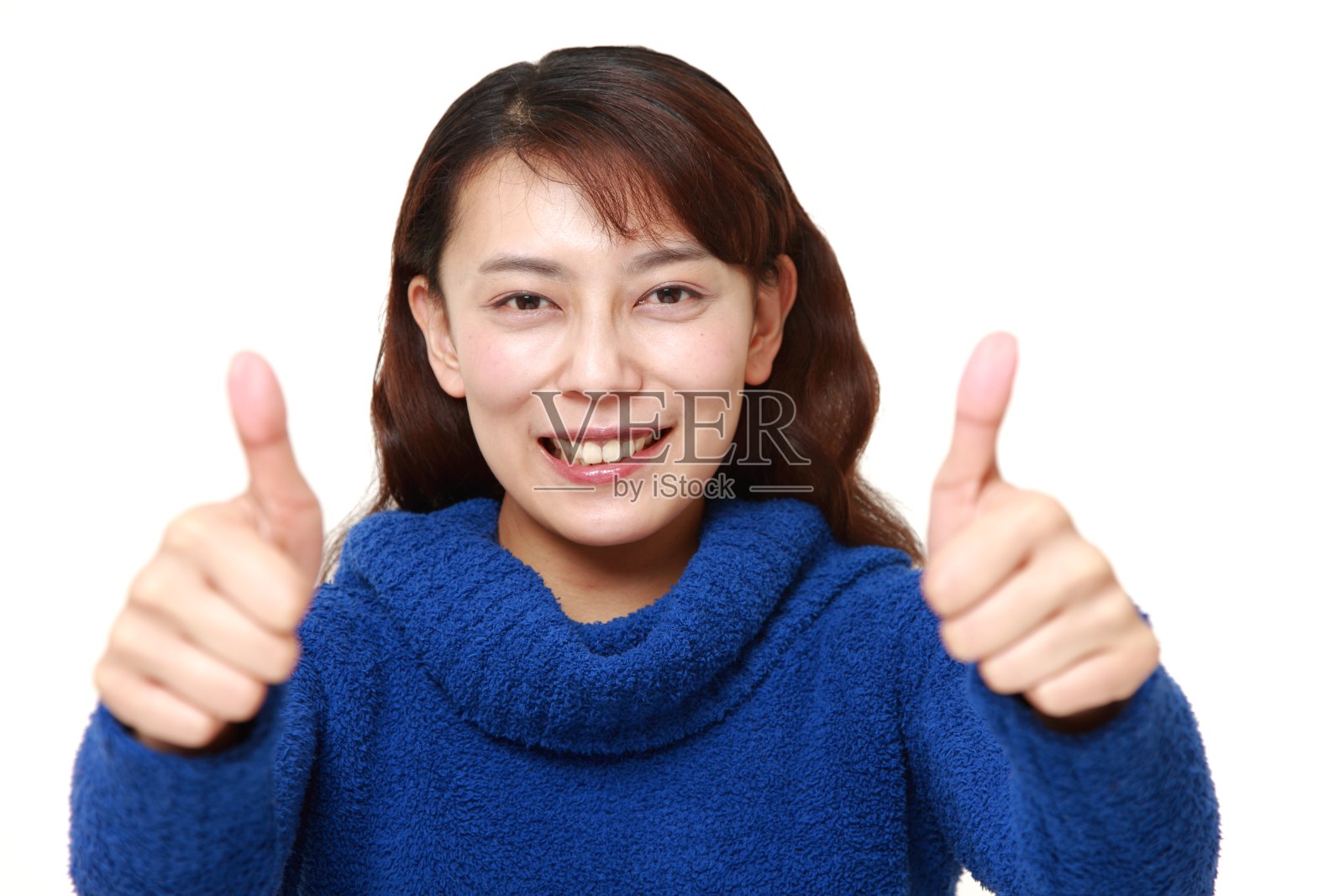 竖起大拇指的女人照片摄影图片
