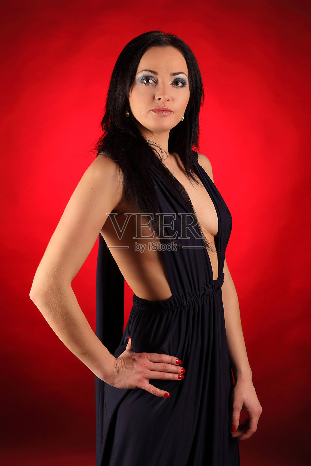 穿着圣诞老人衣服的性感美女肖像,工作室照片摄影图片