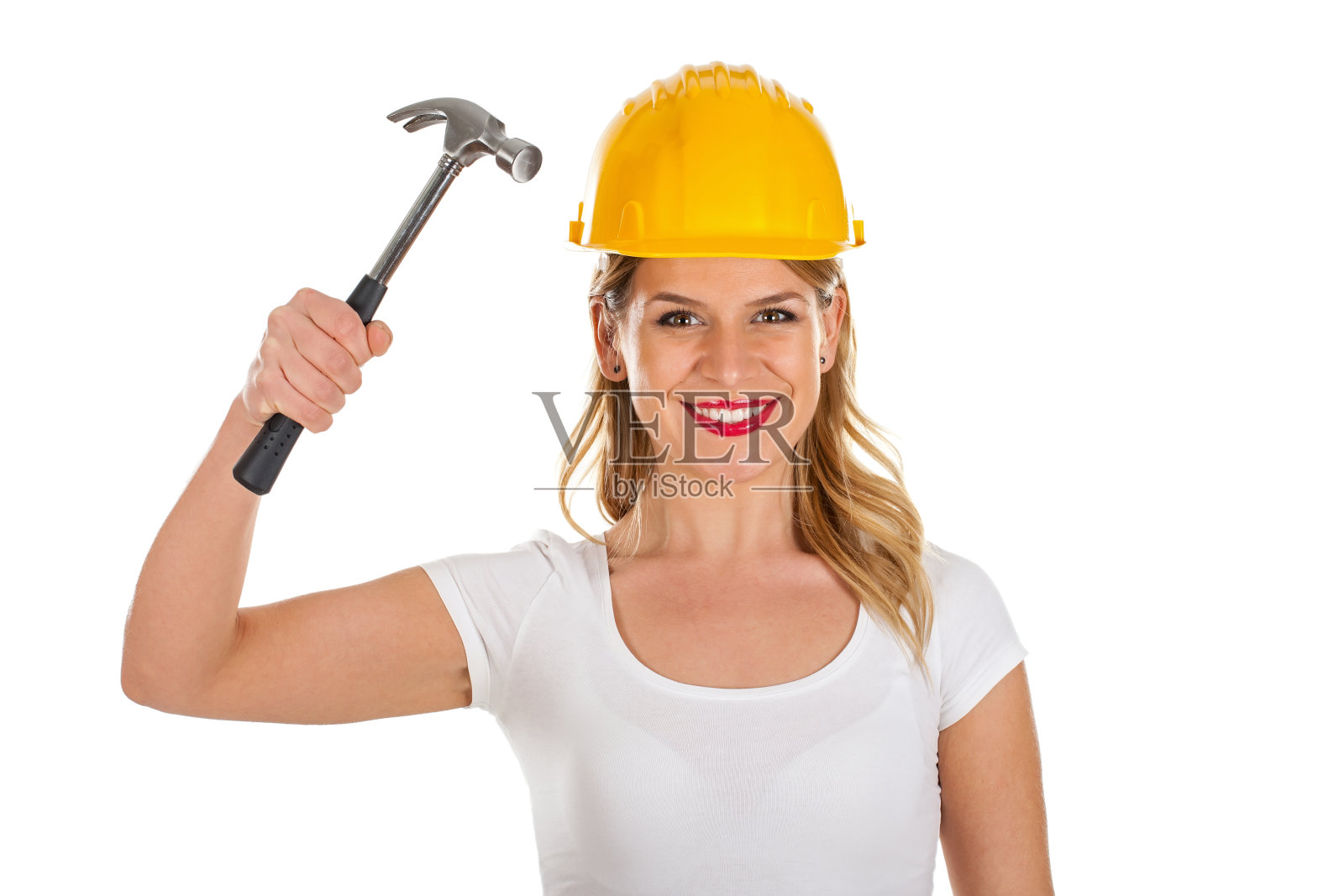 性感的女工程师,手里拿着锤子照片摄影图片