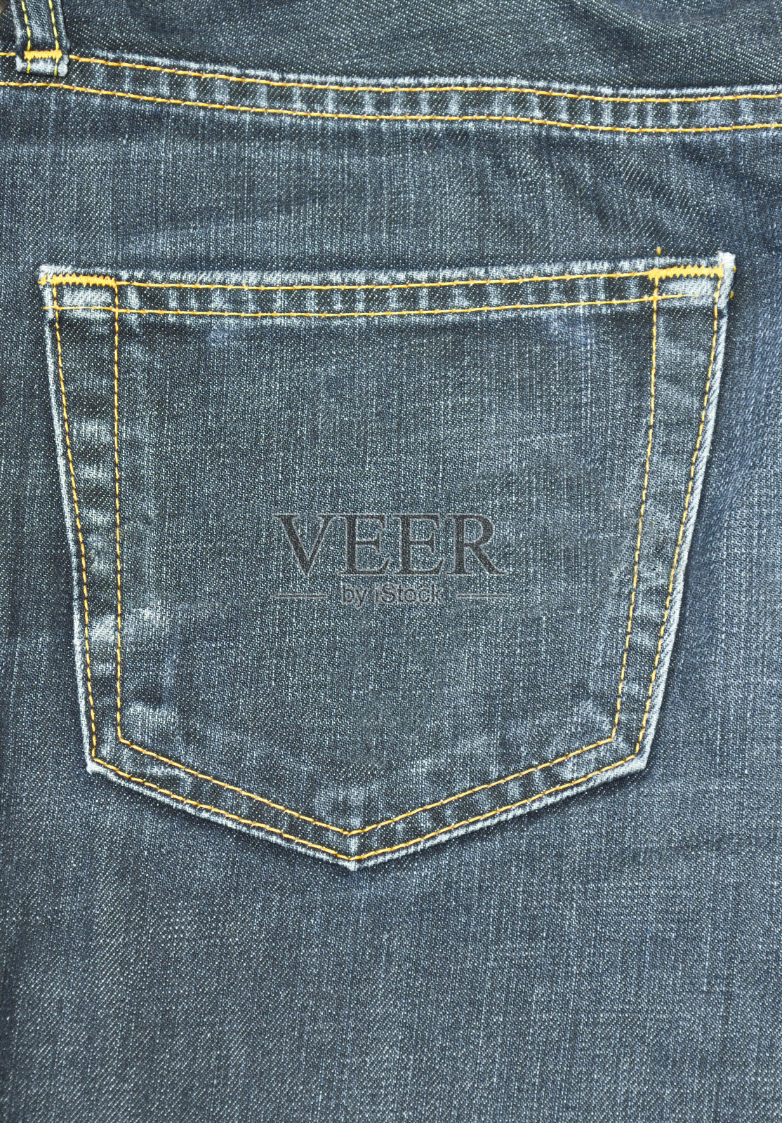 牛仔裤的口袋里照片摄影图片