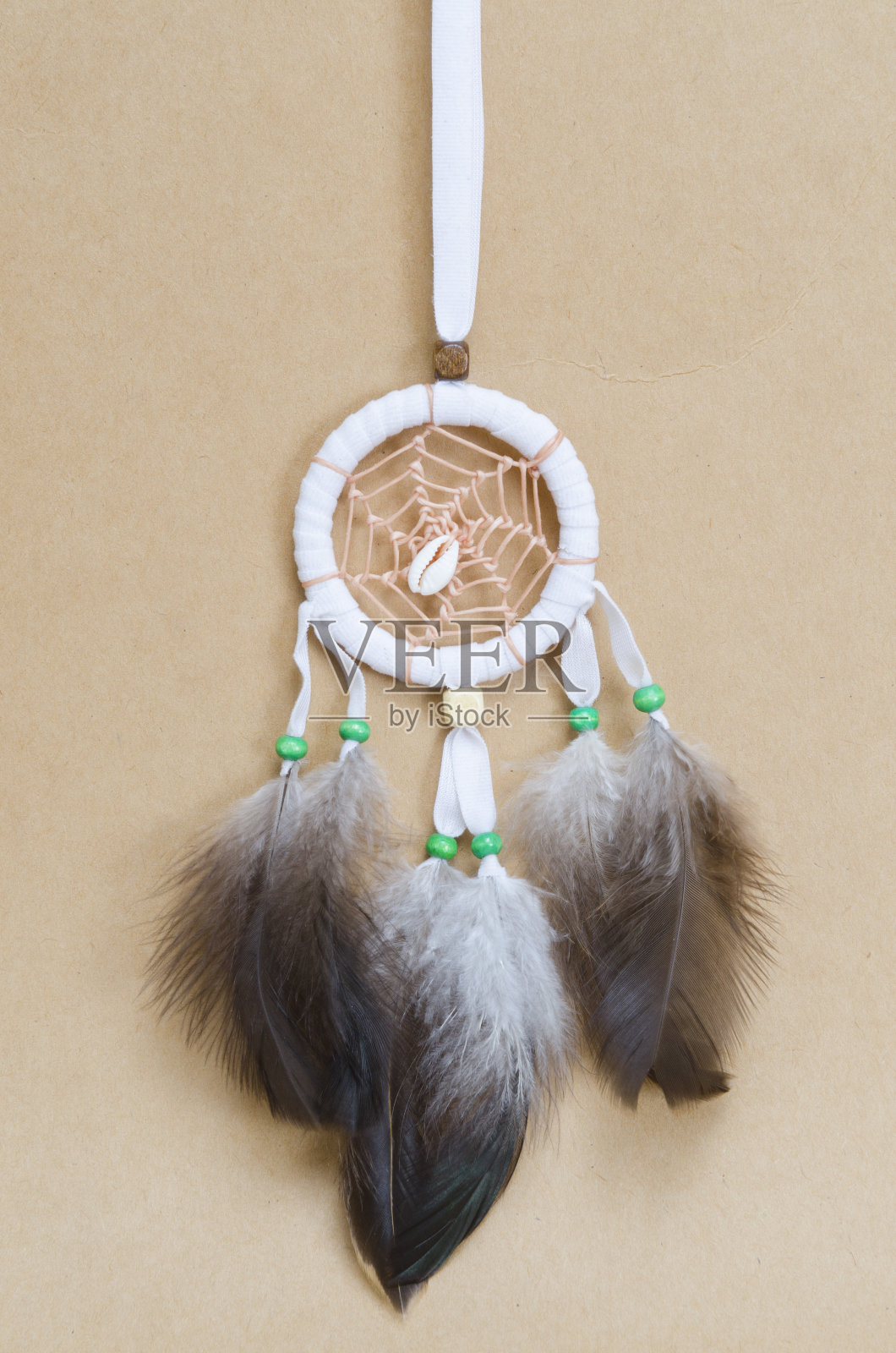 复古棕色背景上的捕梦网照片摄影图片