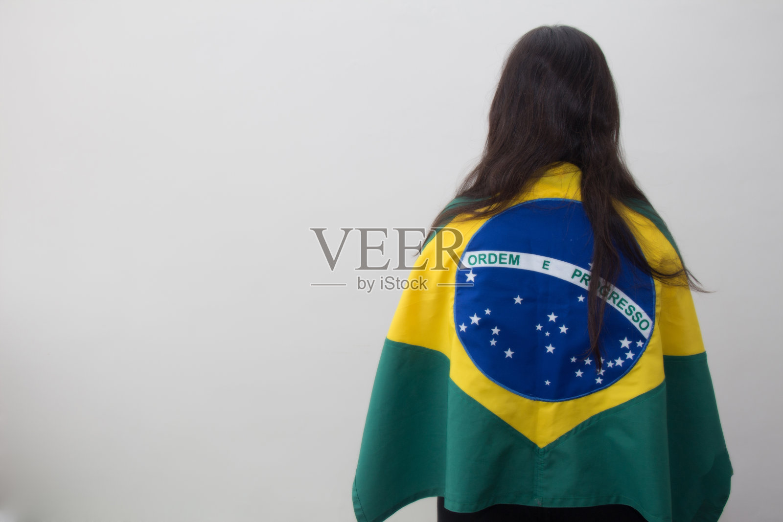 白色背景中插着国旗的女人照片摄影图片