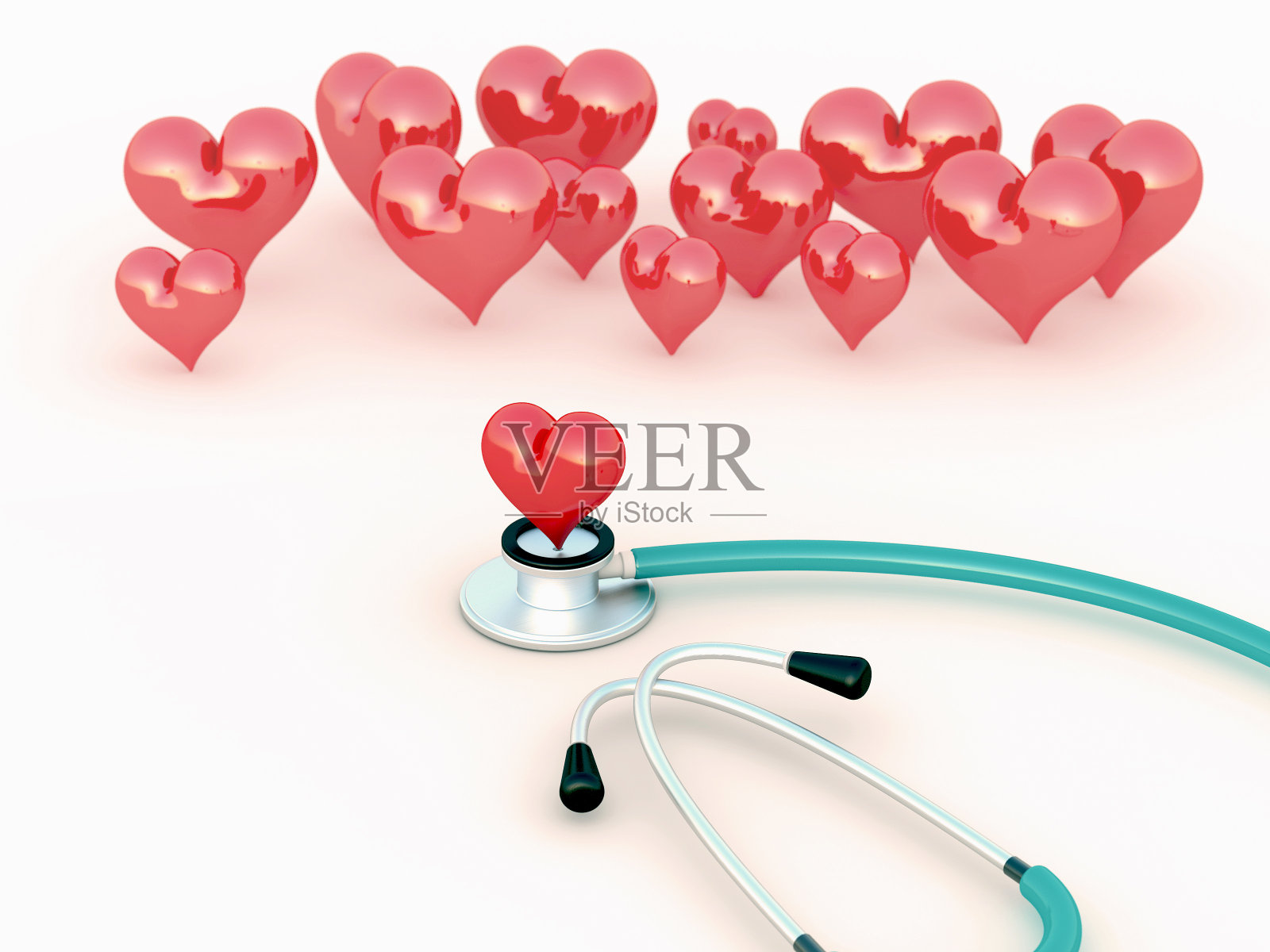 白色背景下的听诊器和心脏照片摄影图片