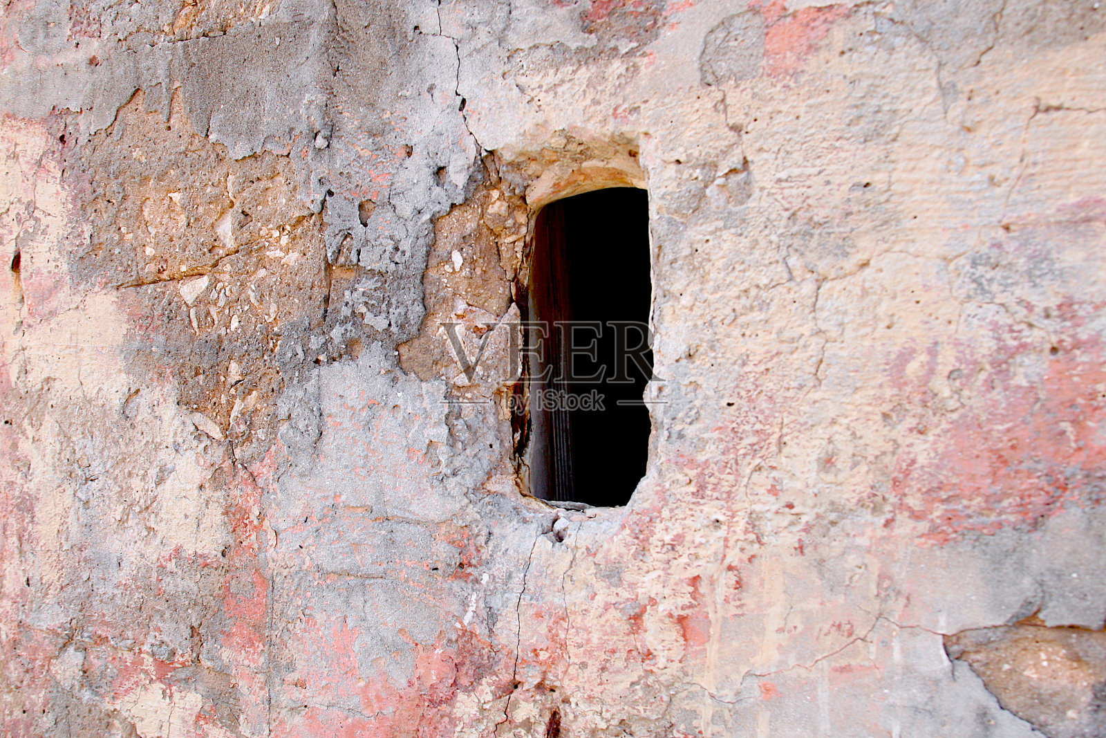 石头和混凝土墙上的洞照片摄影图片