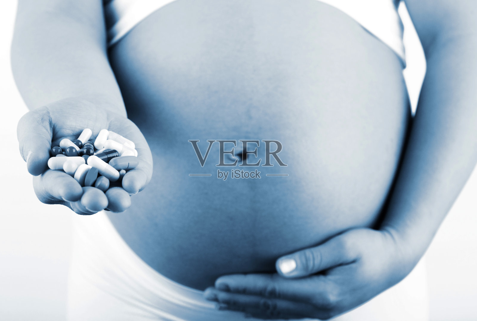 怀孕和药片照片摄影图片