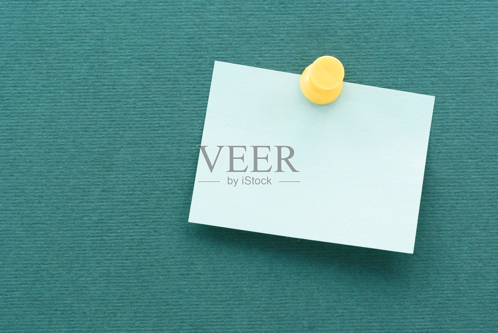 亮绿色的纸条在格伦纹理纸上照片摄影图片