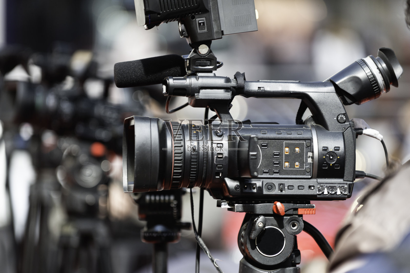 电视摄影机拍摄记者招待会照片摄影图片