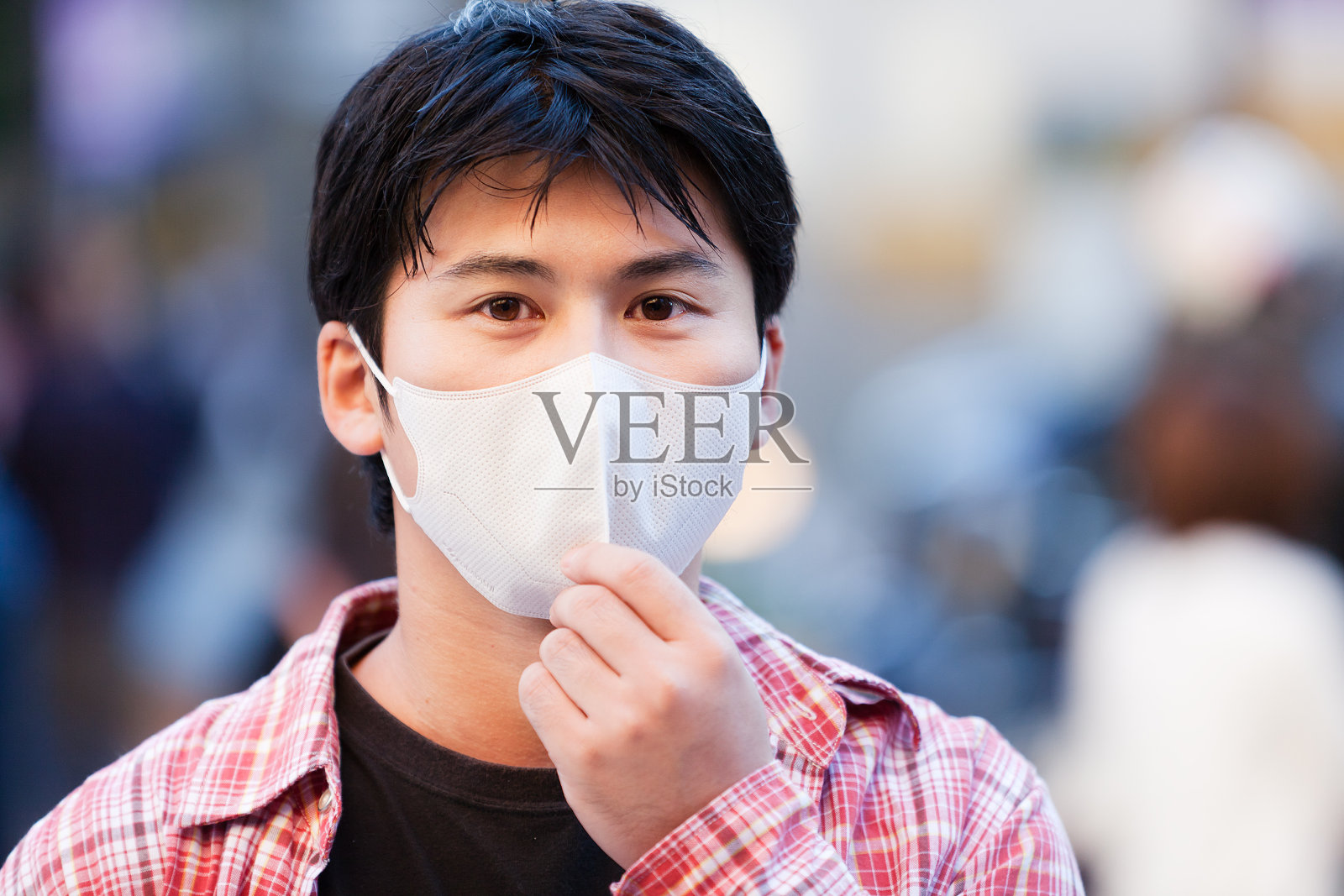 带面罩的亚洲人照片摄影图片