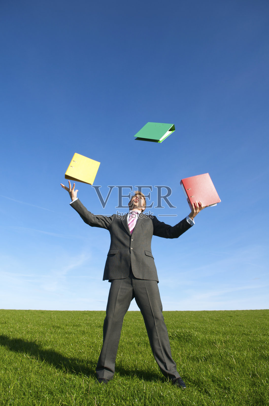 商人在Bright Meadow杂耍文件文件夹照片摄影图片