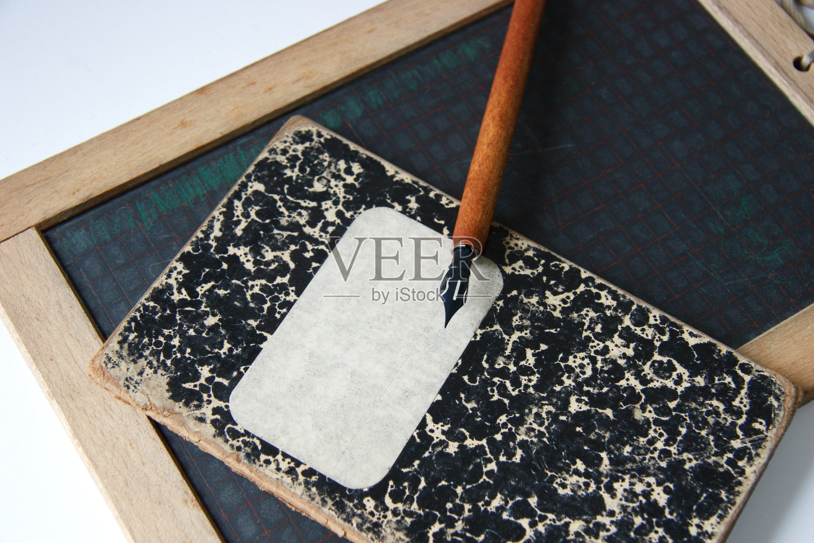 石板和旧练习本照片摄影图片