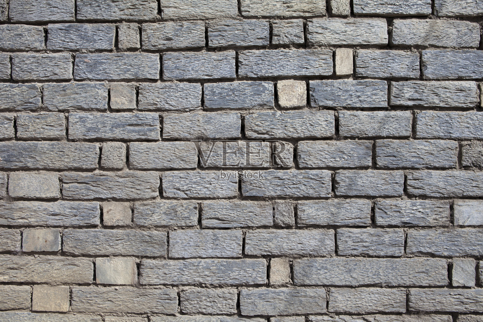 石刻成砖砌成墙照片摄影图片