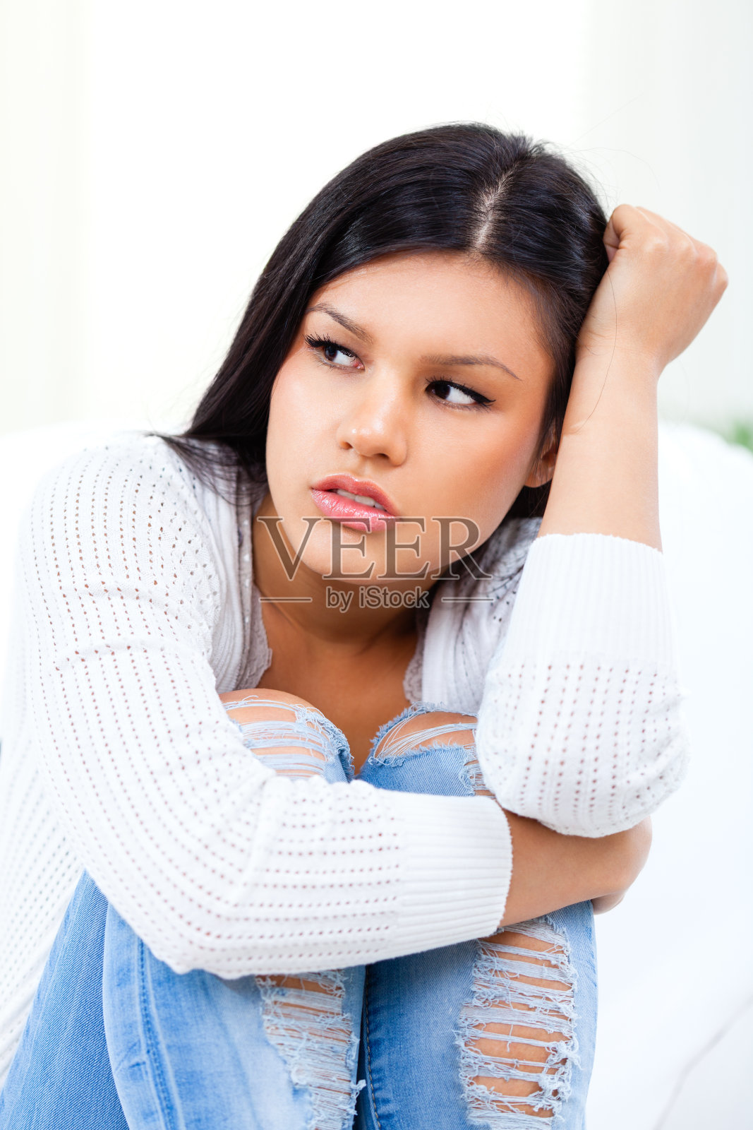 悲伤的年轻女孩照片摄影图片