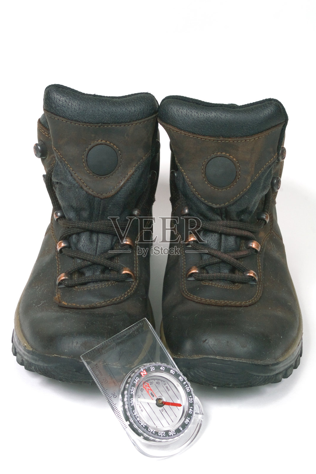 指南针和白色的靴子照片摄影图片