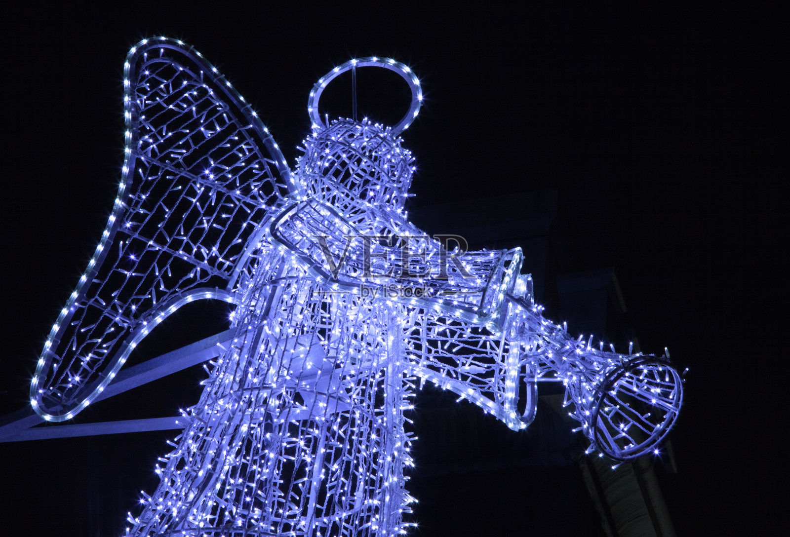 圣诞照明天使吹小号照片摄影图片