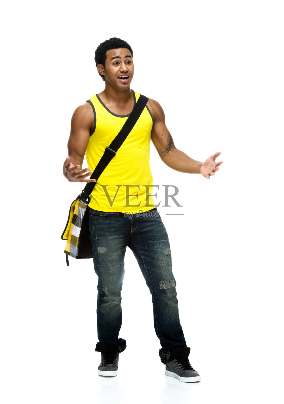 男学生看起来很惊讶照片摄影图片