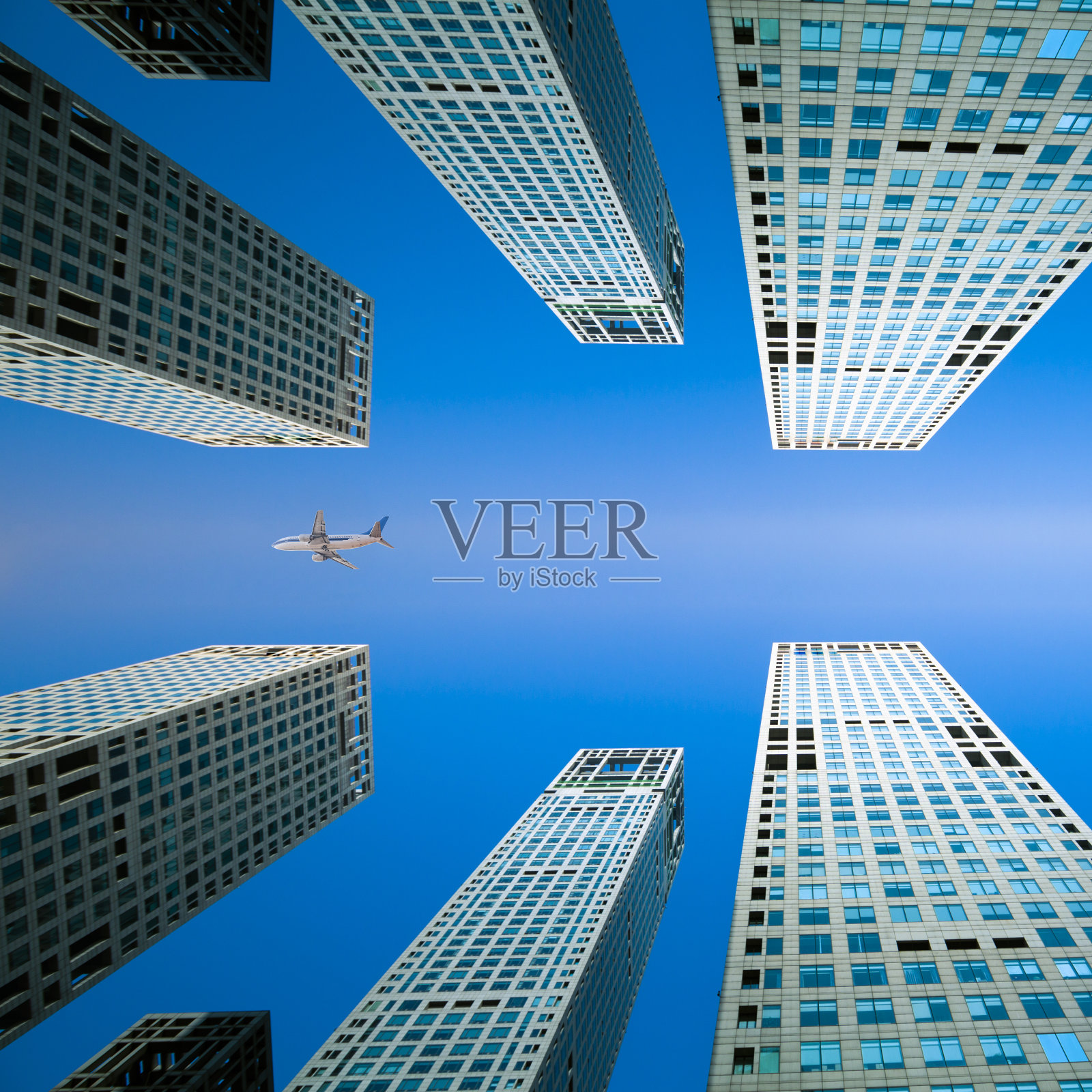 摩天大楼与飞机照片摄影图片