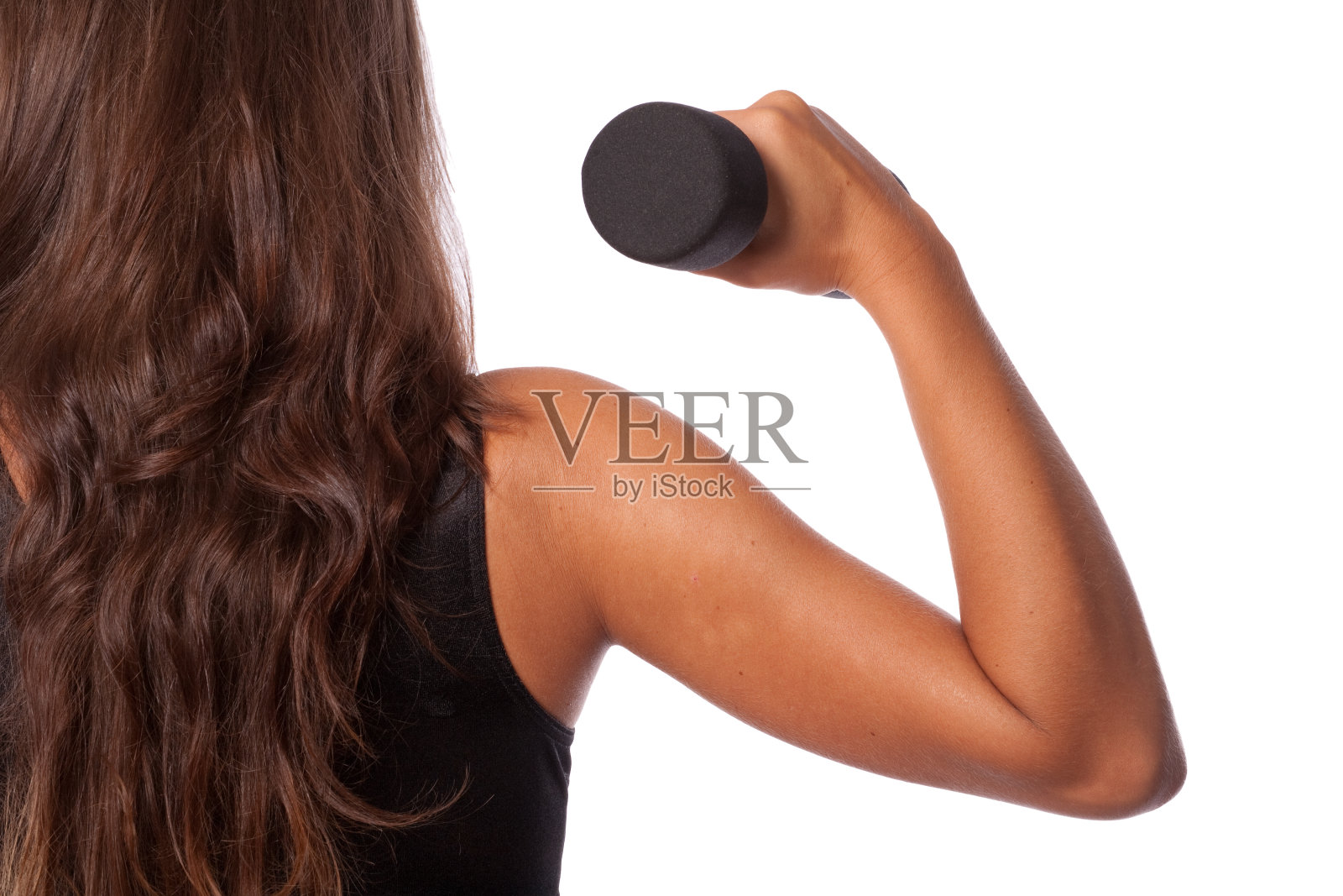 用哑铃近距离练习二头肌照片摄影图片