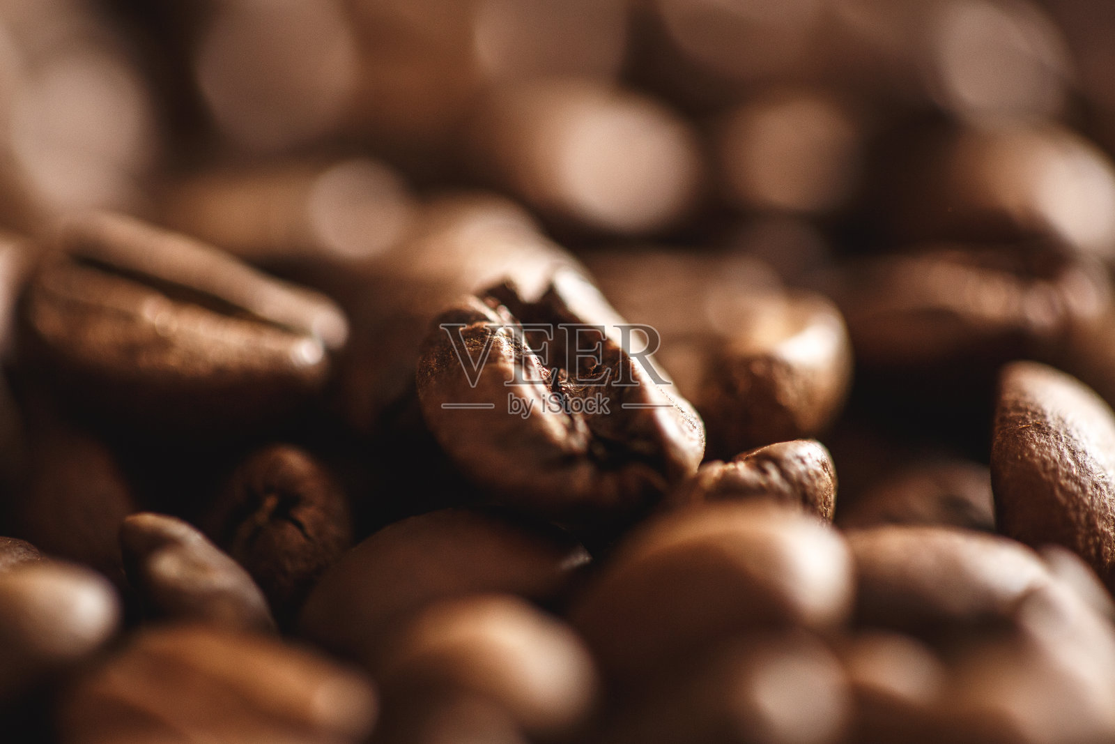 近距离的中等烘焙咖啡豆照片摄影图片