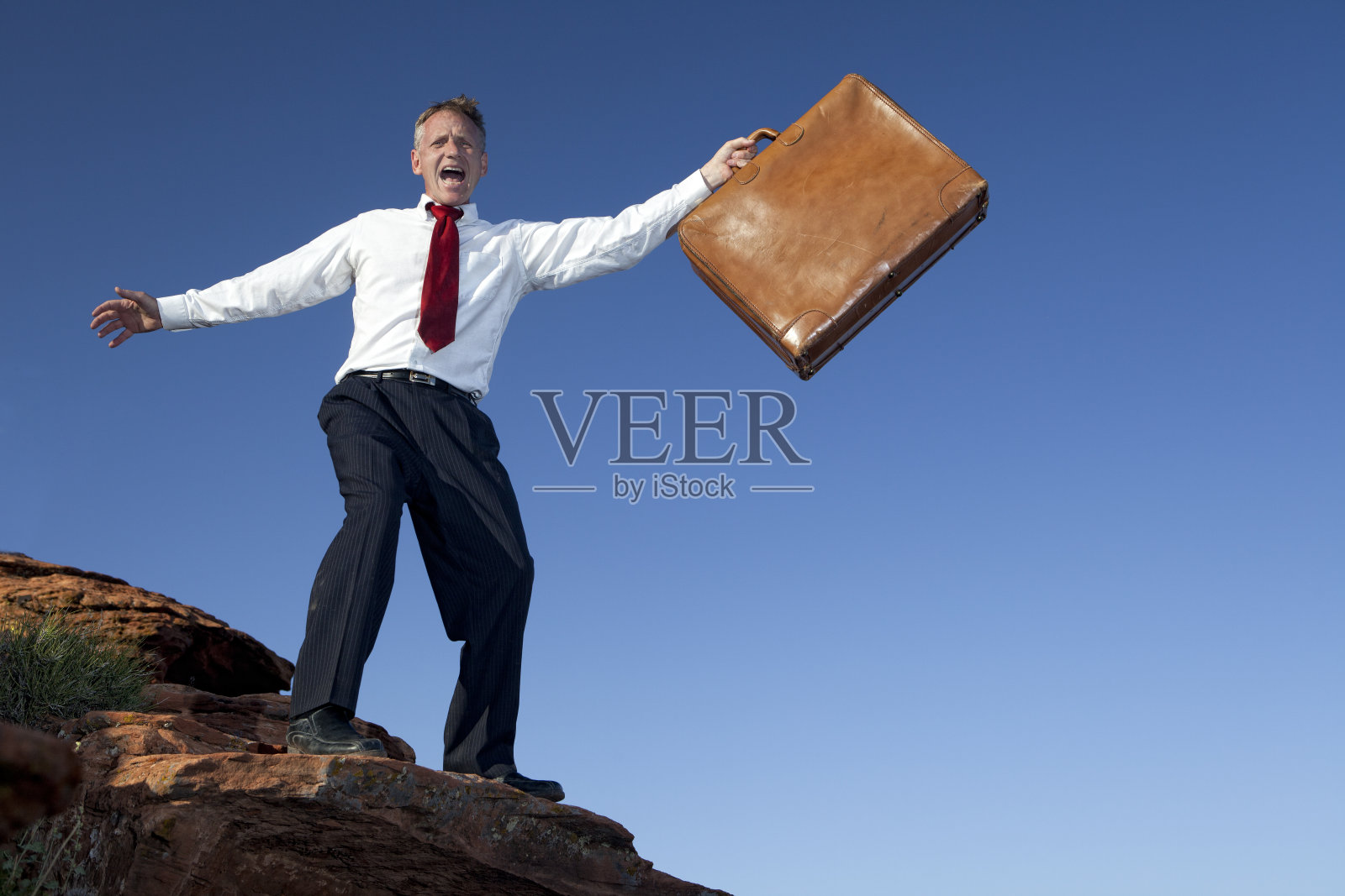 商人兴奋地去照片摄影图片