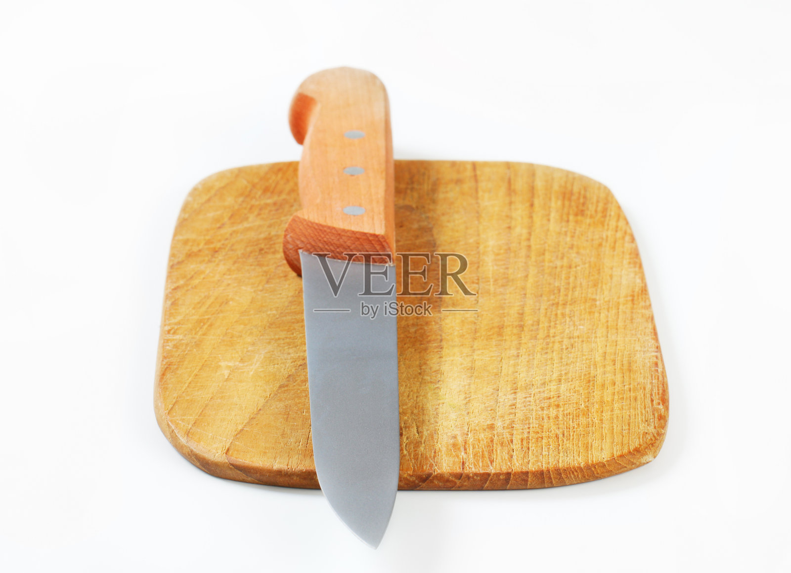 切菜板上的刀照片摄影图片