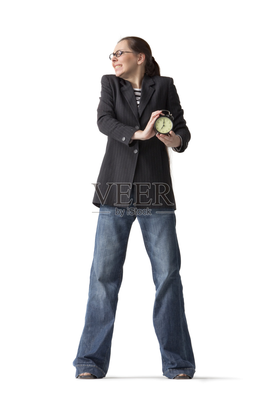 人物:带闹钟的黑发女人照片摄影图片