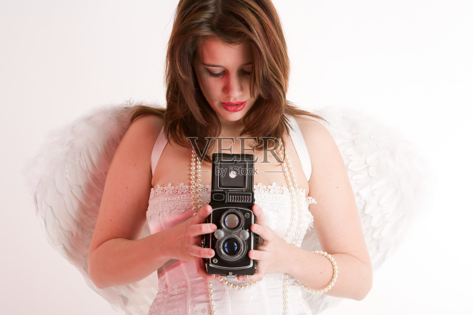 带着翅膀的女人在拍照照片摄影图片