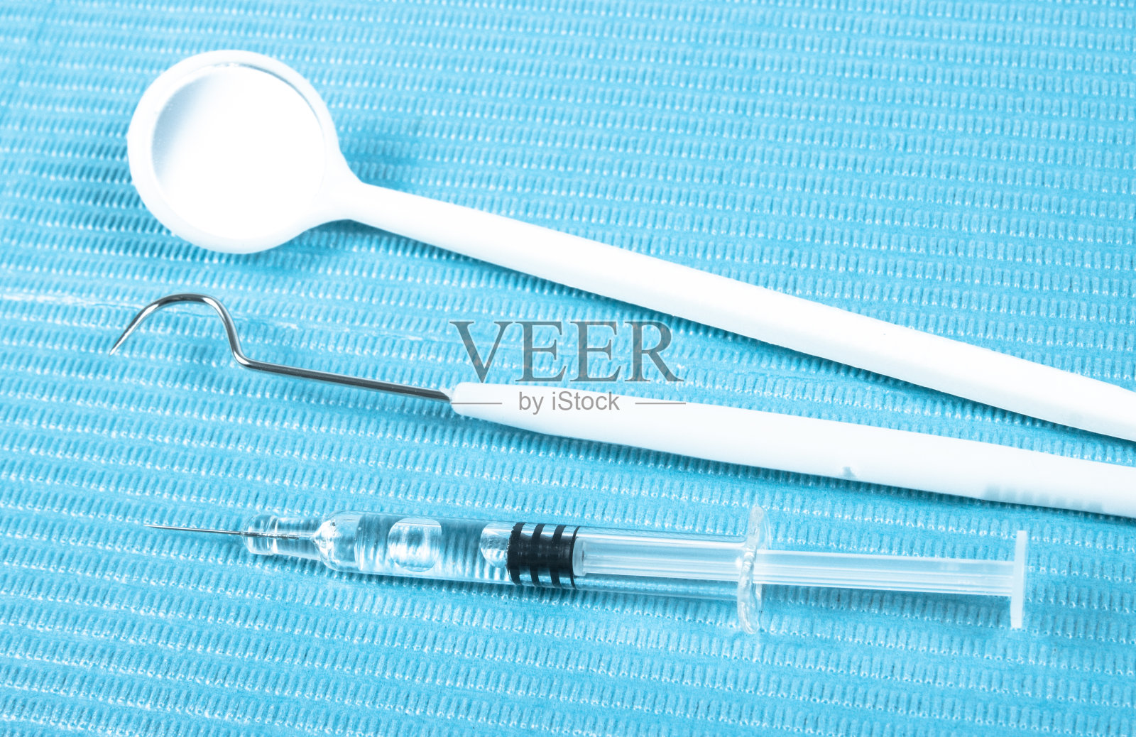 一次性牙科工具。照片摄影图片