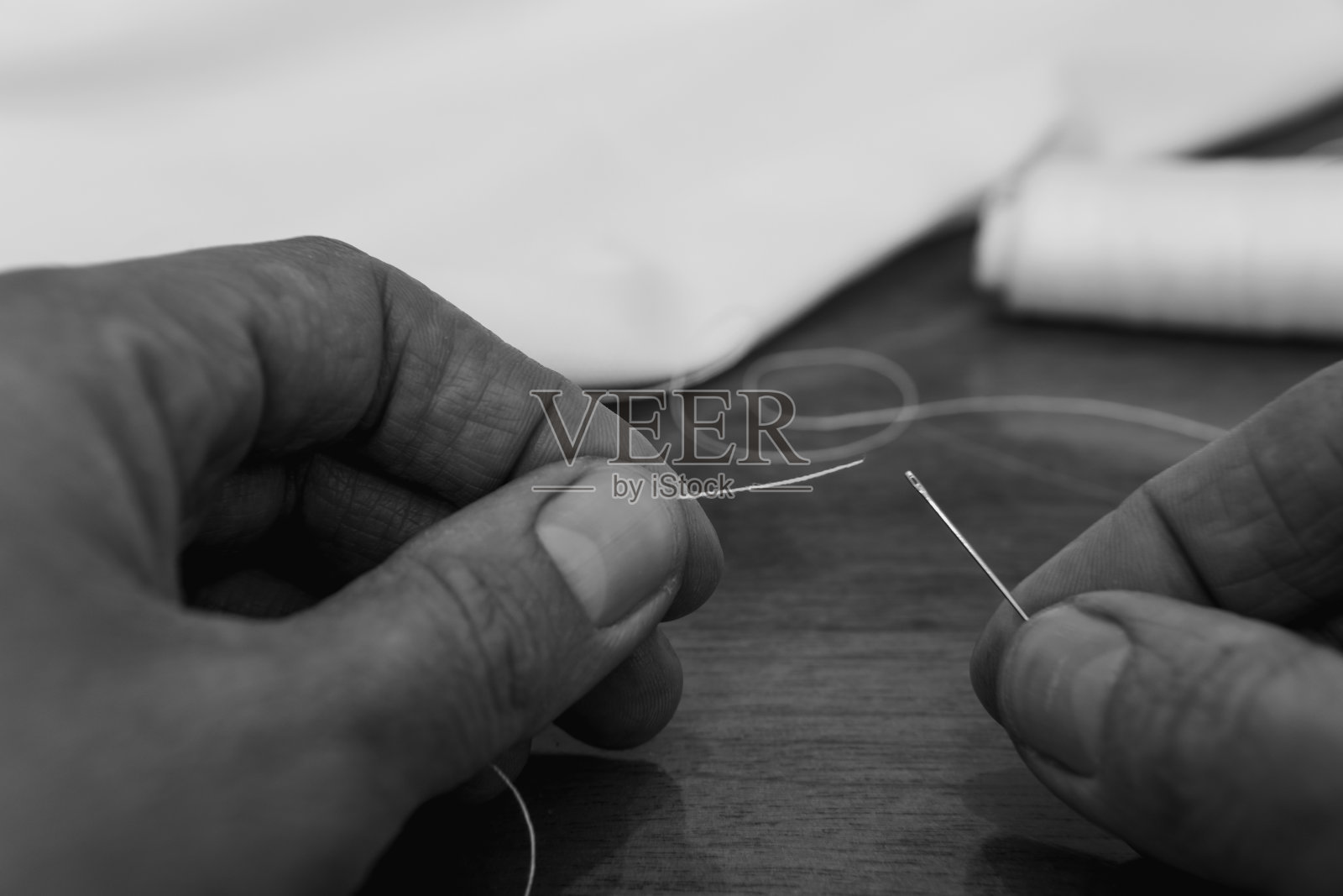 穿针照片摄影图片