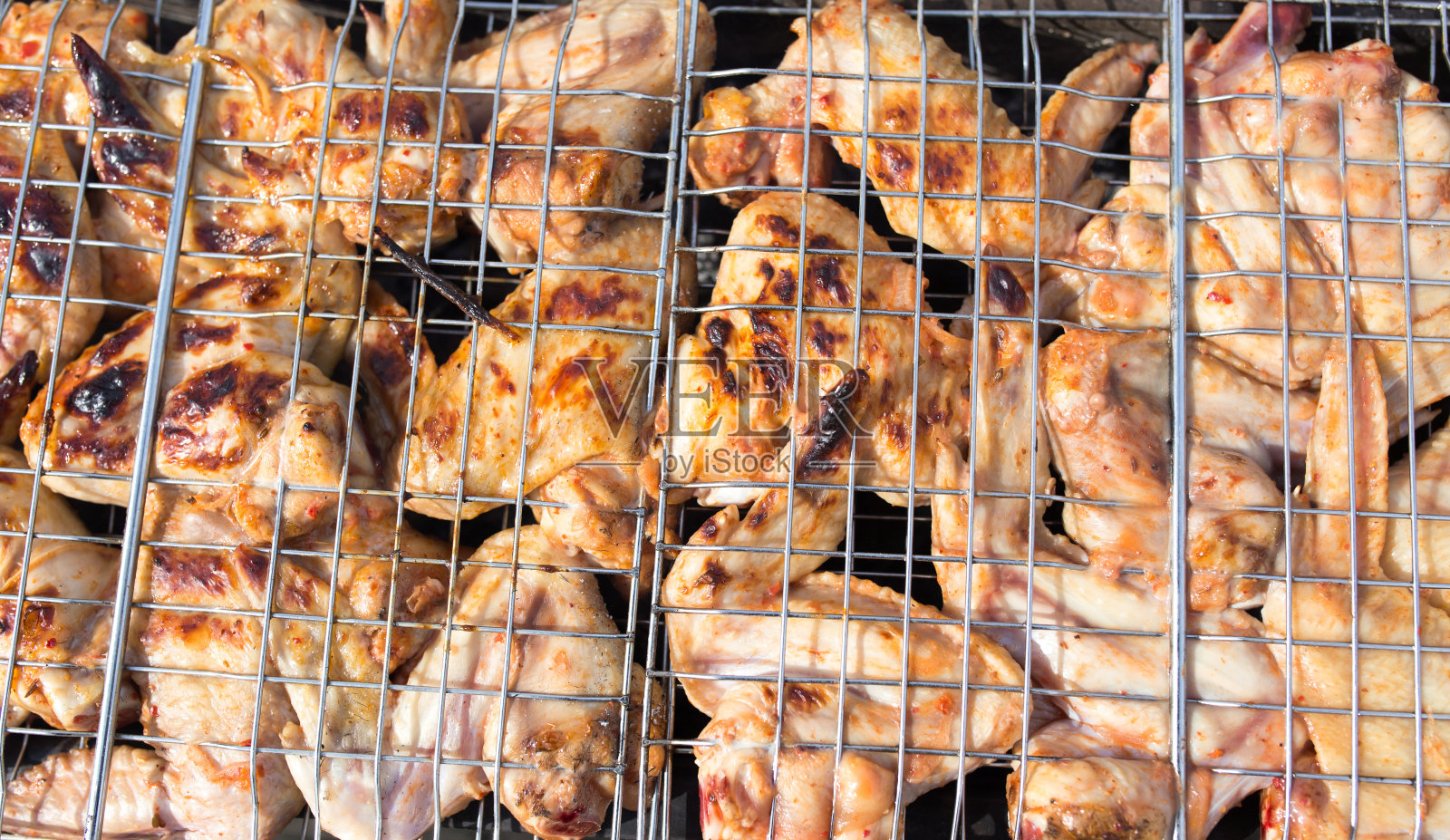 在露天烧烤的肉照片摄影图片