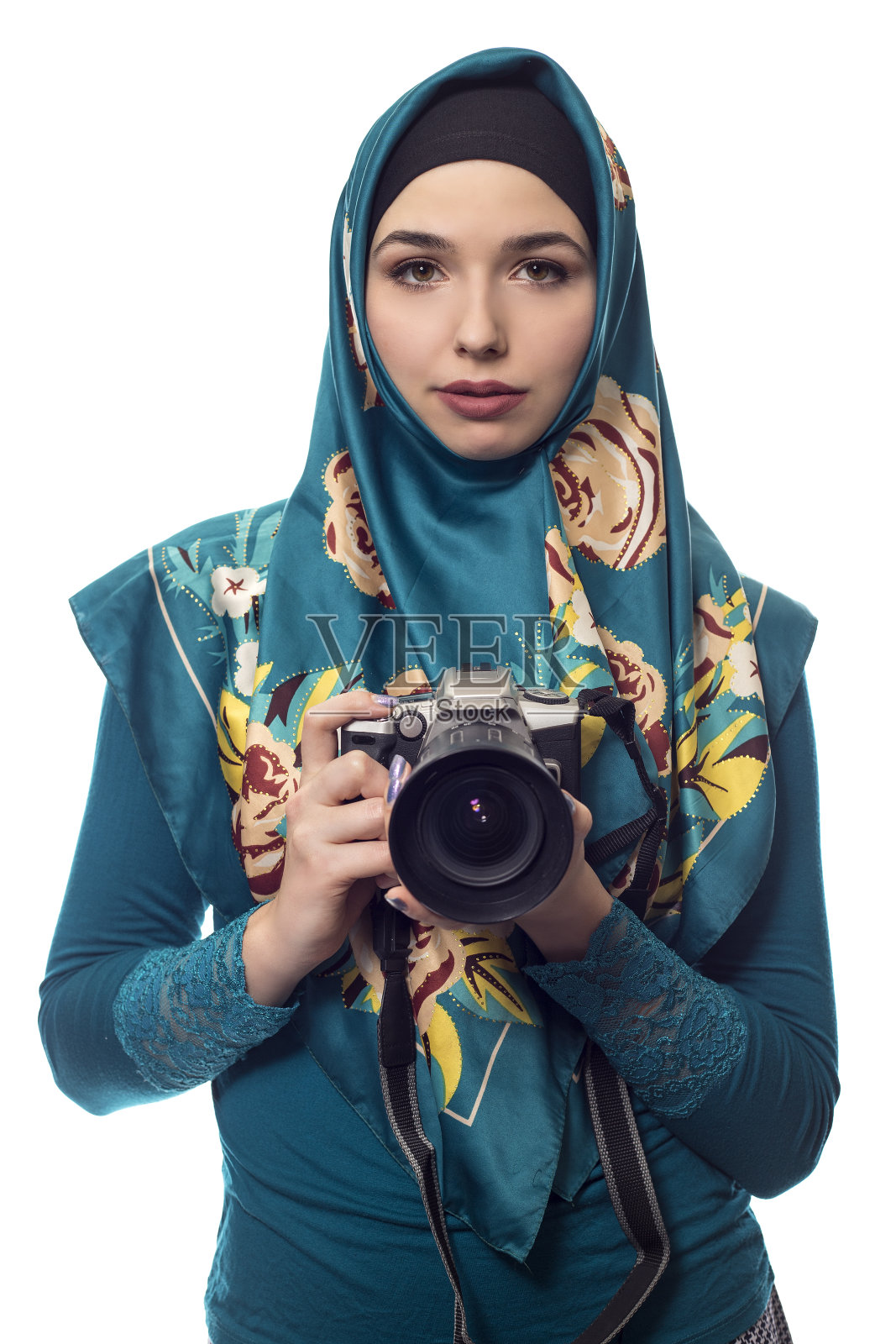 戴着头巾和相机的摄影师或记者照片摄影图片