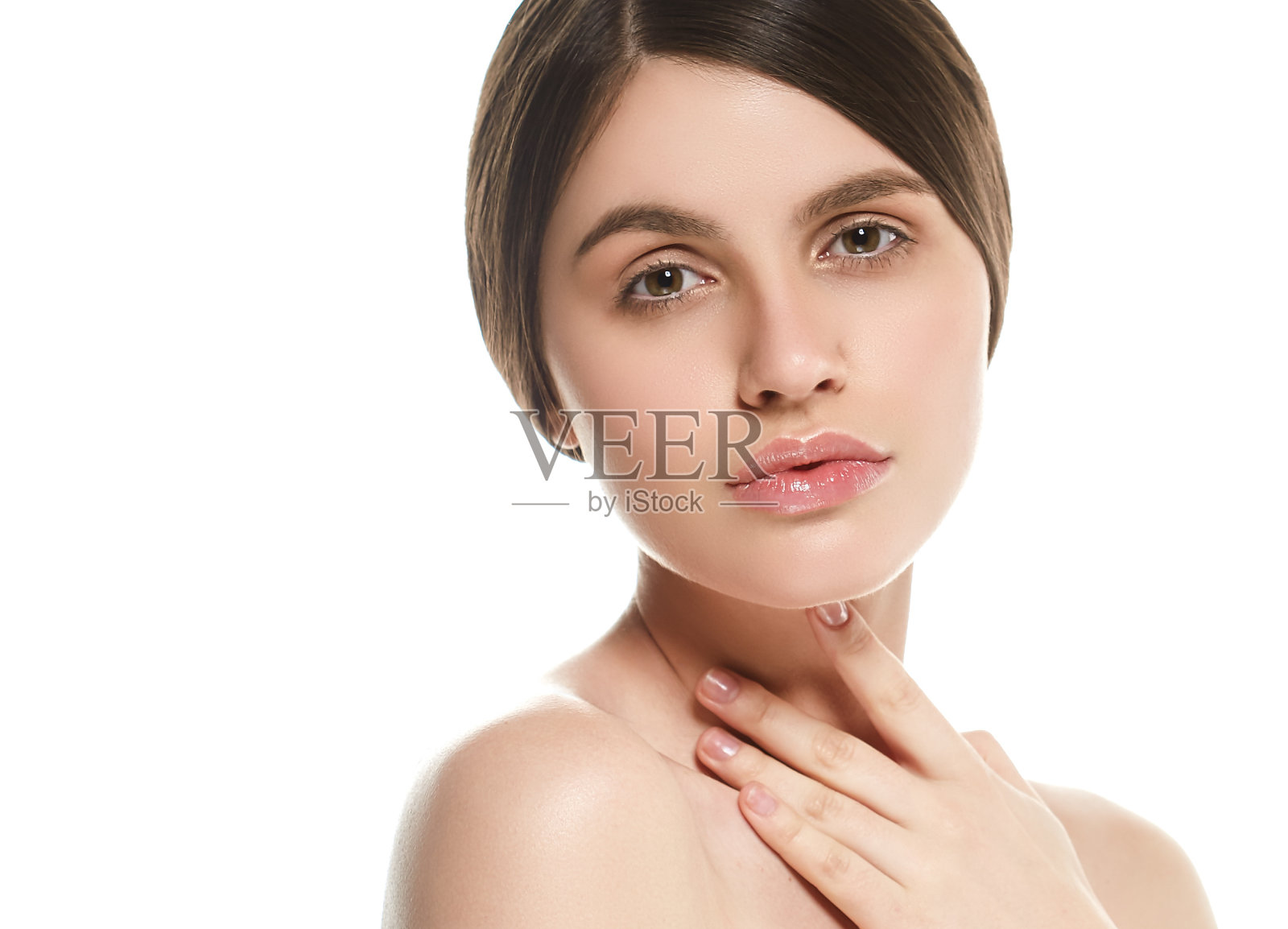 美丽的女人面部画像美丽的皮肤护理概念美丽的年轻女性模特女孩抚摸她的脸照片摄影图片