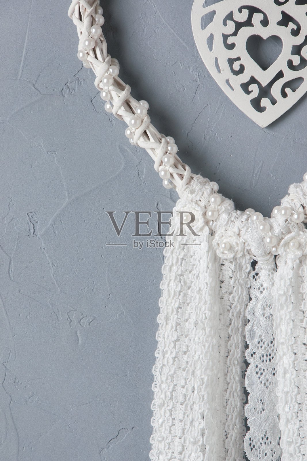 白心花边捕梦网照片摄影图片