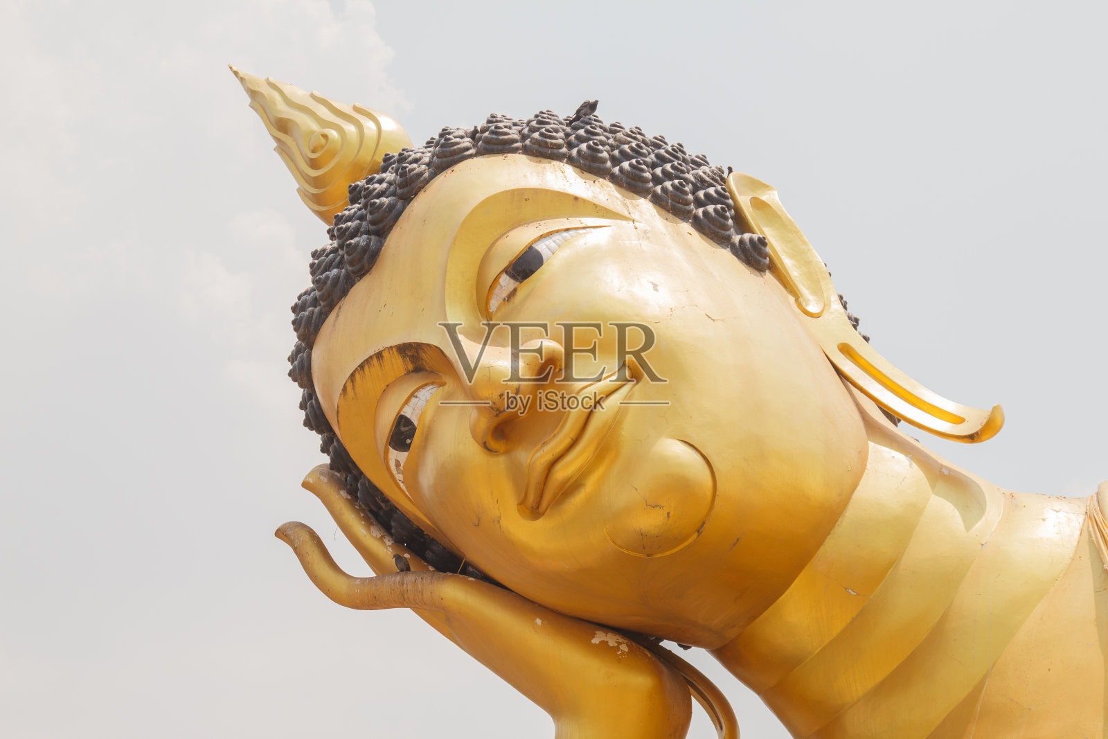 近距离的卧佛的脸照片摄影图片