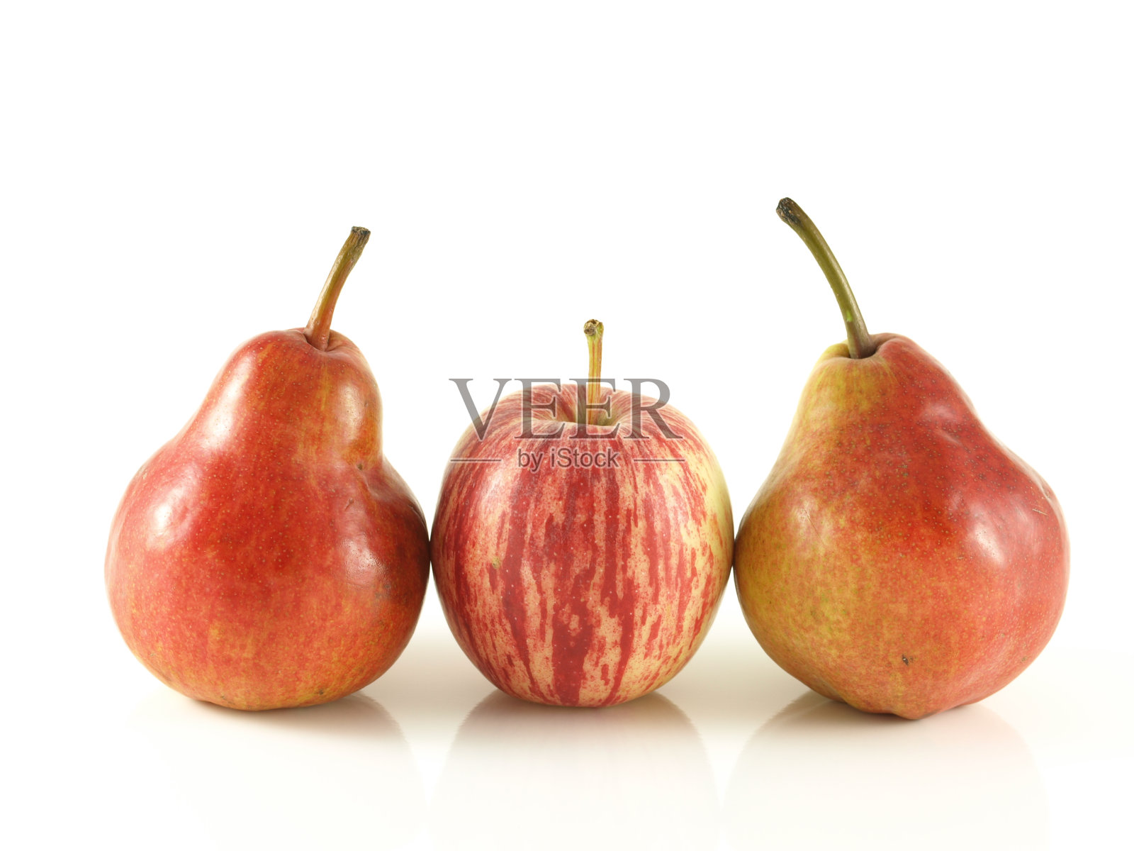 梨和苹果。照片摄影图片