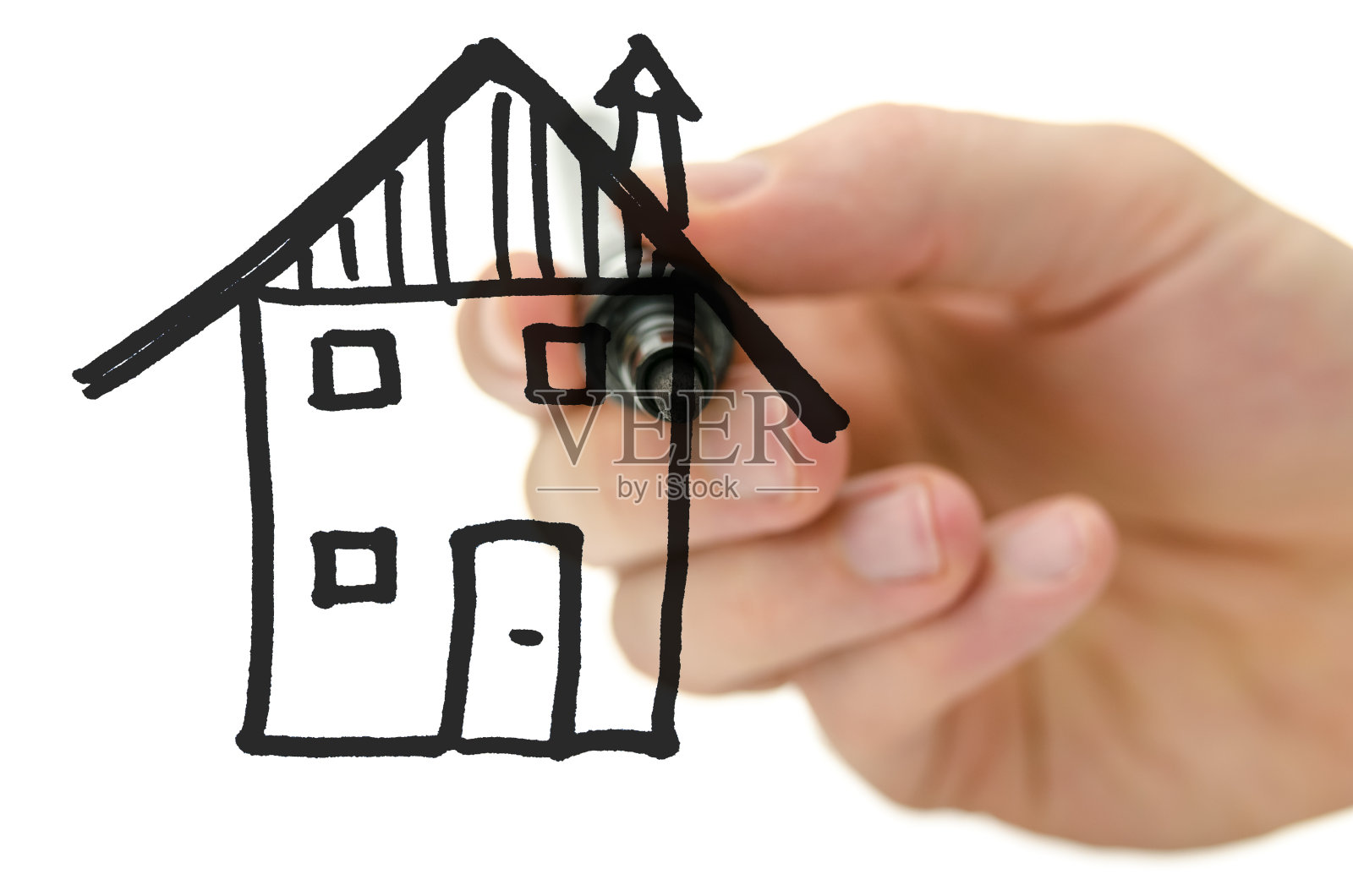 男人在虚拟白板上画房子照片摄影图片