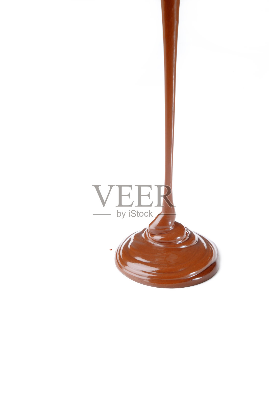 白色背景上的液体巧克力照片摄影图片