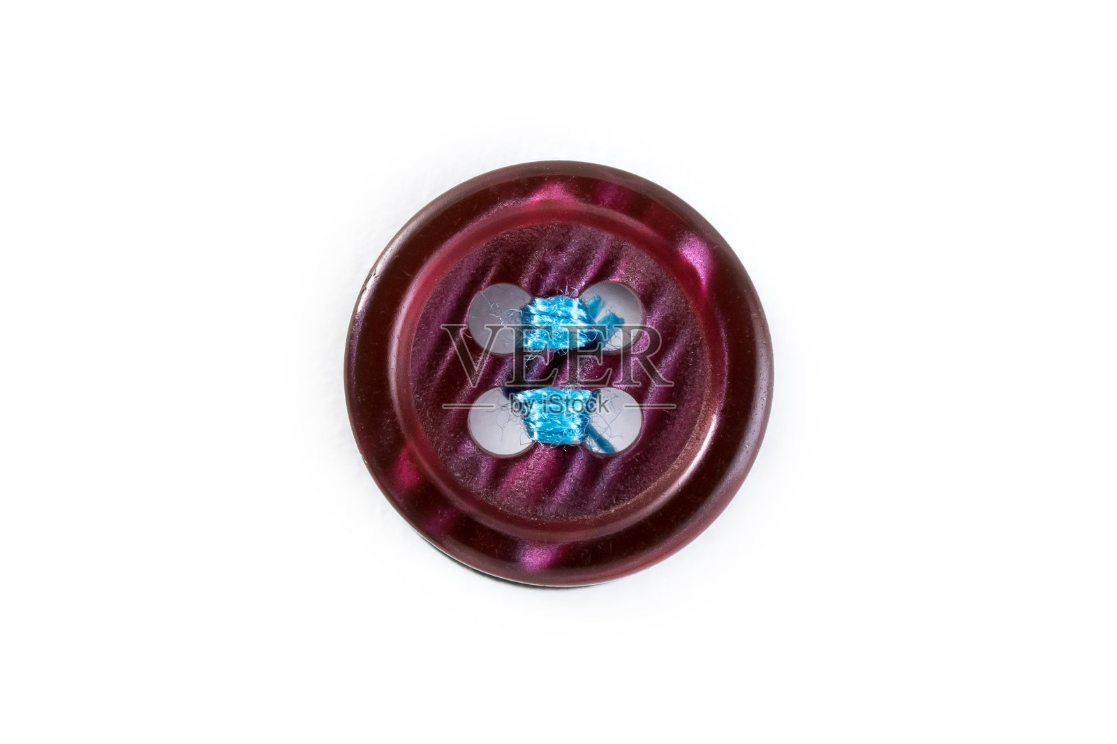 纽扣与蓝色的线在白色的背景照片摄影图片